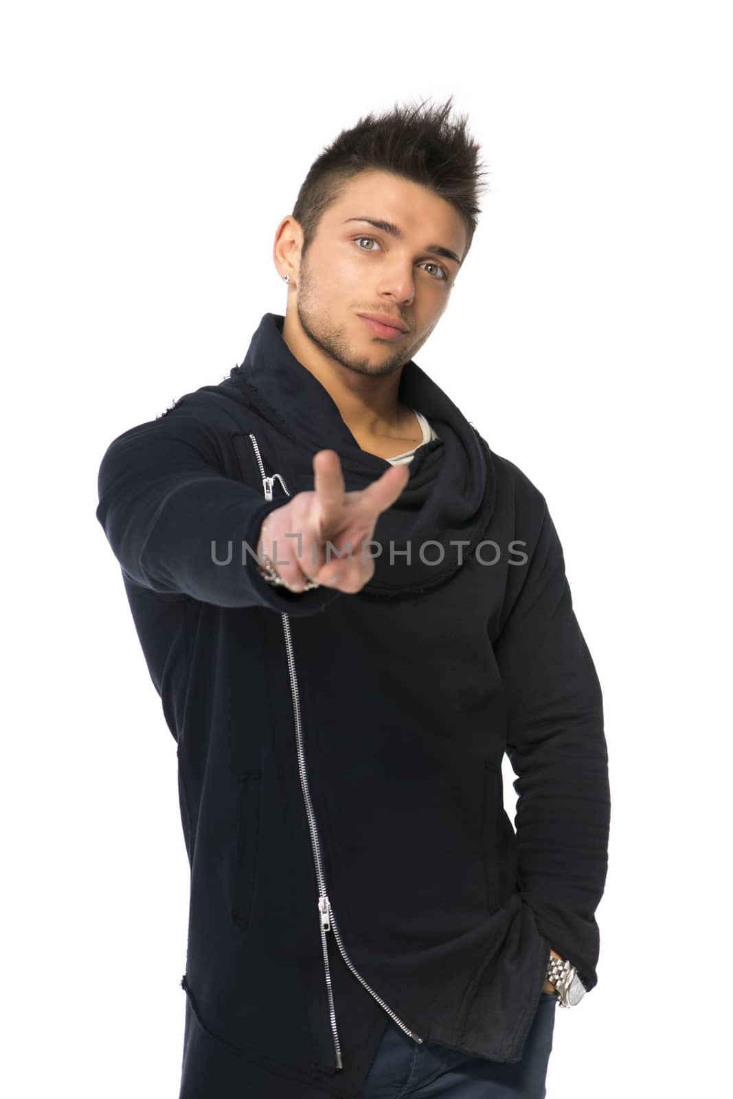 Attractive young man doing peace or victory sign with two fingers, isolated on white
