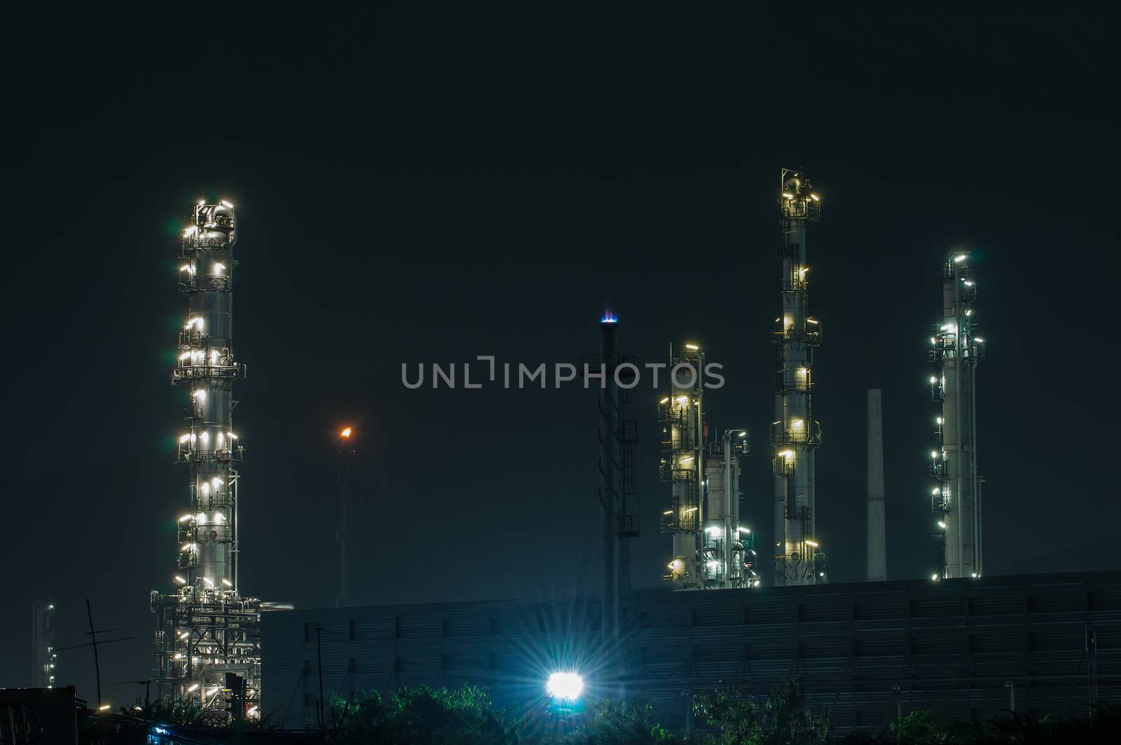 Oil refinery plant at dusk, power station