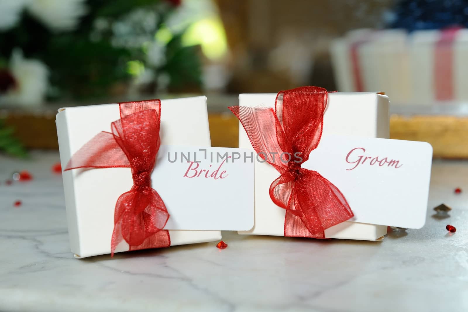 Bride and groom decorative boxes at wedding reception