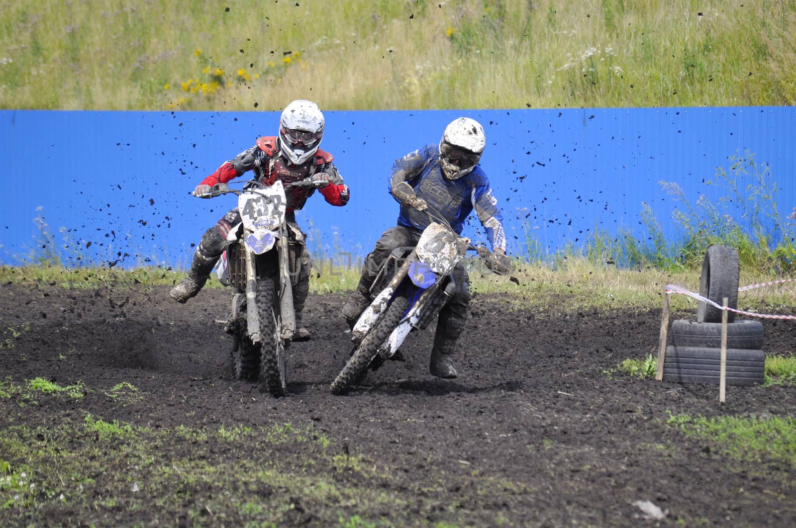 Racers on motorcycles participate in cross-country race competitions. 02.08.2014, Tyumen