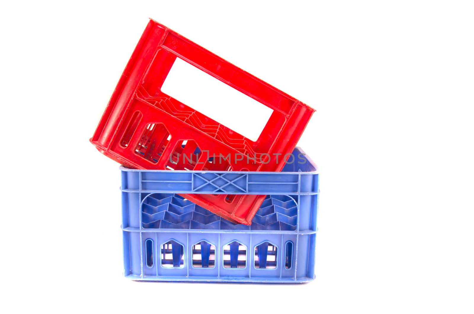 two colorful plastic storage bottle plastic crates isolated on white 