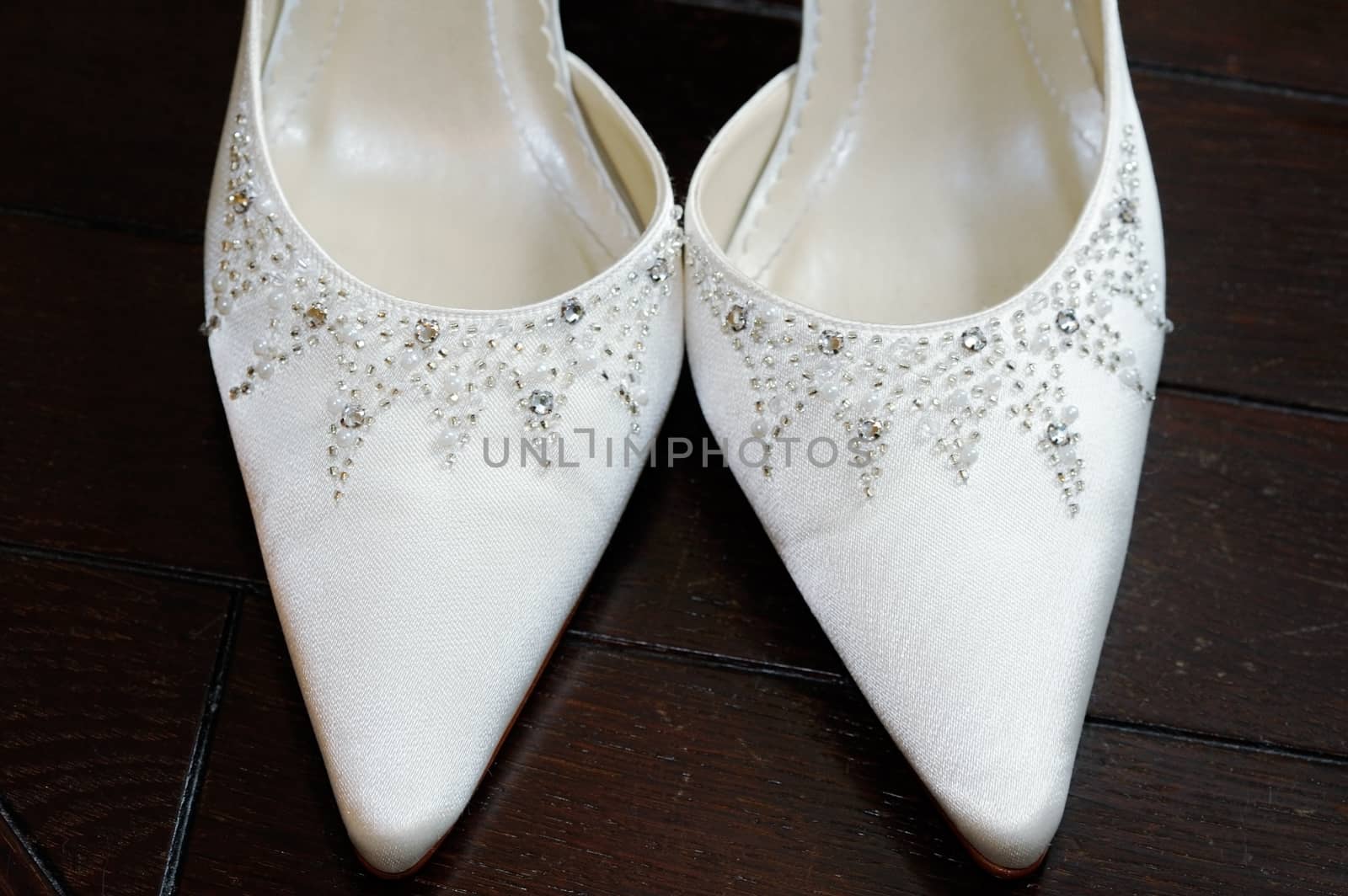 Brides white shoes closeup detail