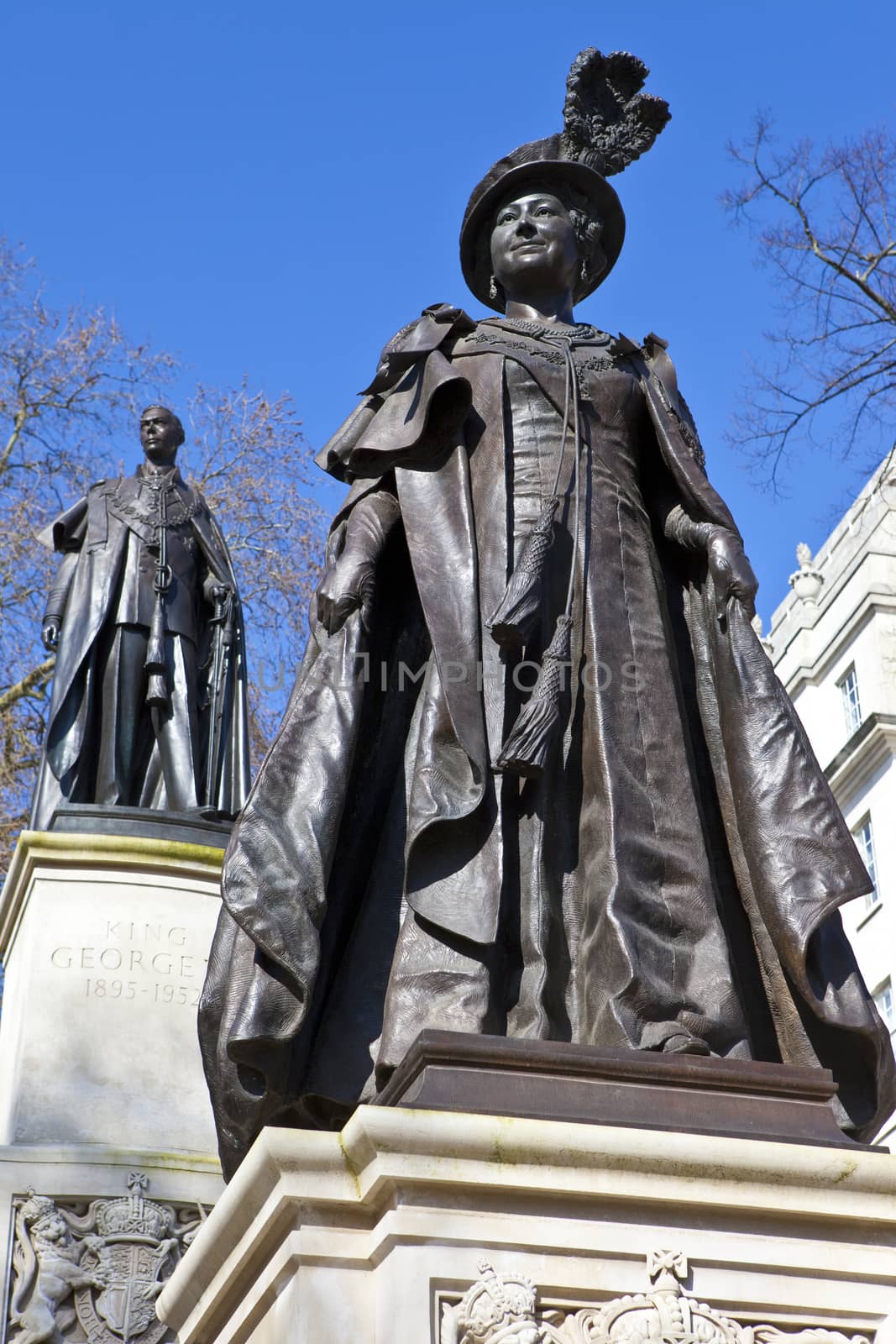 Statues of Elizabeth The Queen Mother and King George IV situated in Carlton Gardens, near The Mall in London.