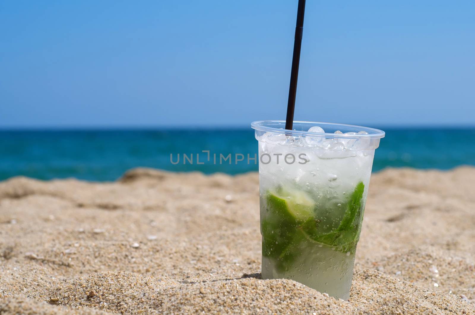 Mojito cocktail on the beach by anytka