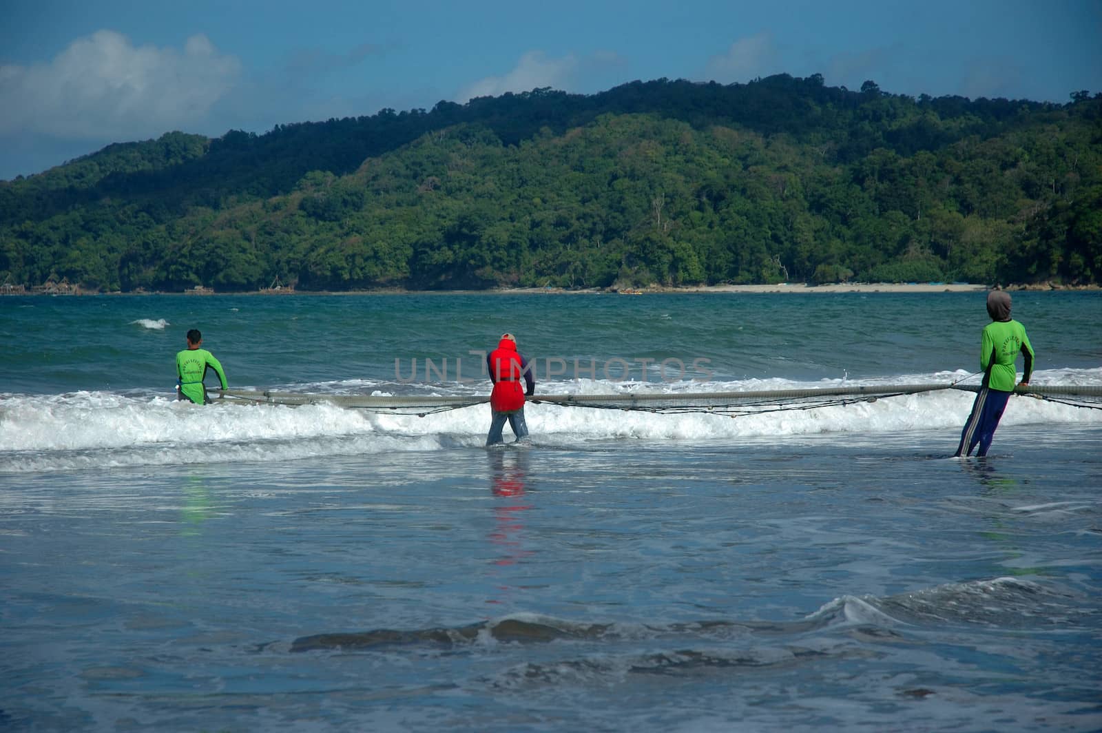 Pangandaran, Indonesia - July 16, 2011: Fisherman at Pangandaran beach, West Java-Indonesia.