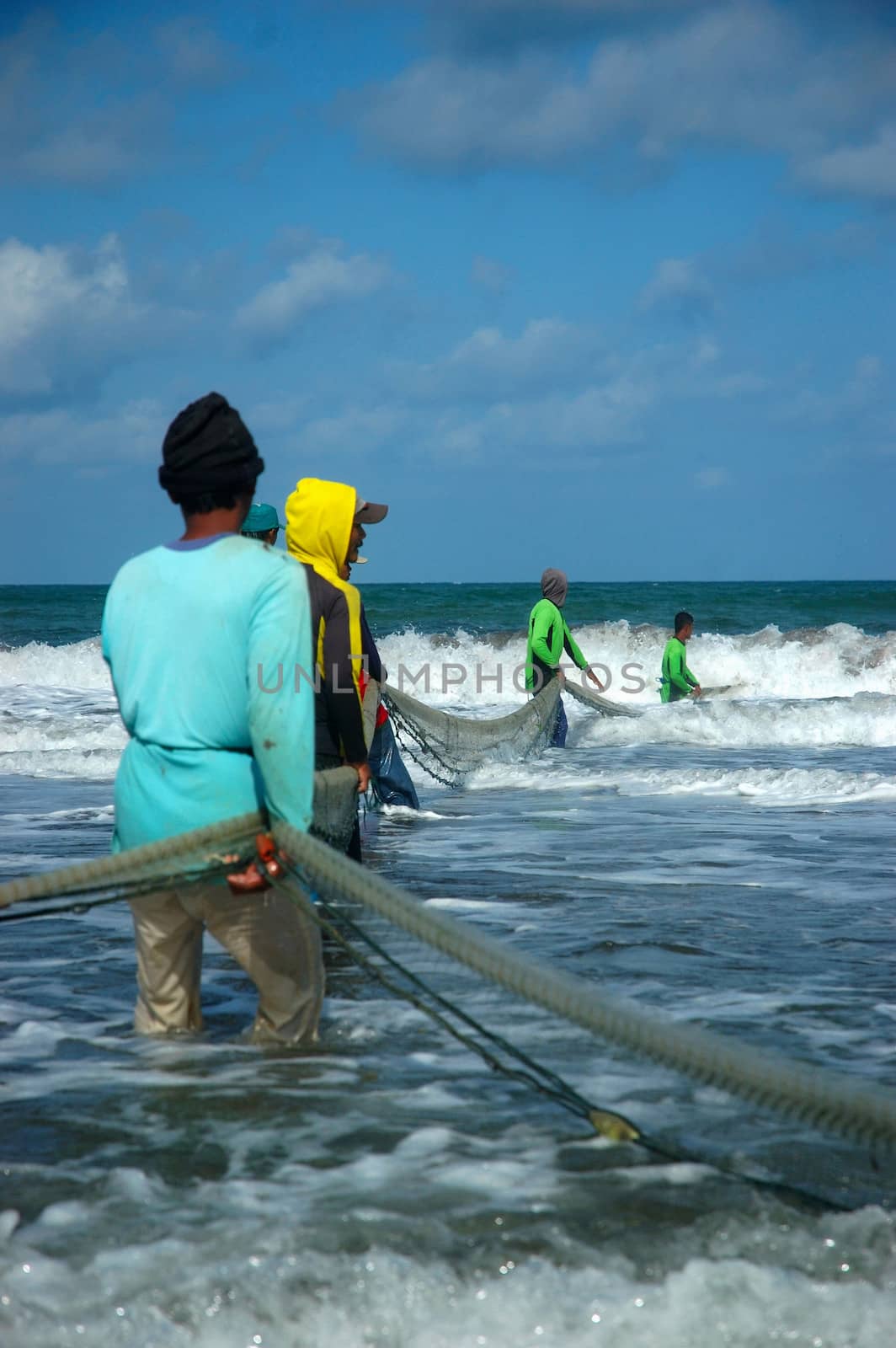 Pangandaran, Indonesia - July 16, 2011: Fisherman at Pangandaran beach, West Java-Indonesia.