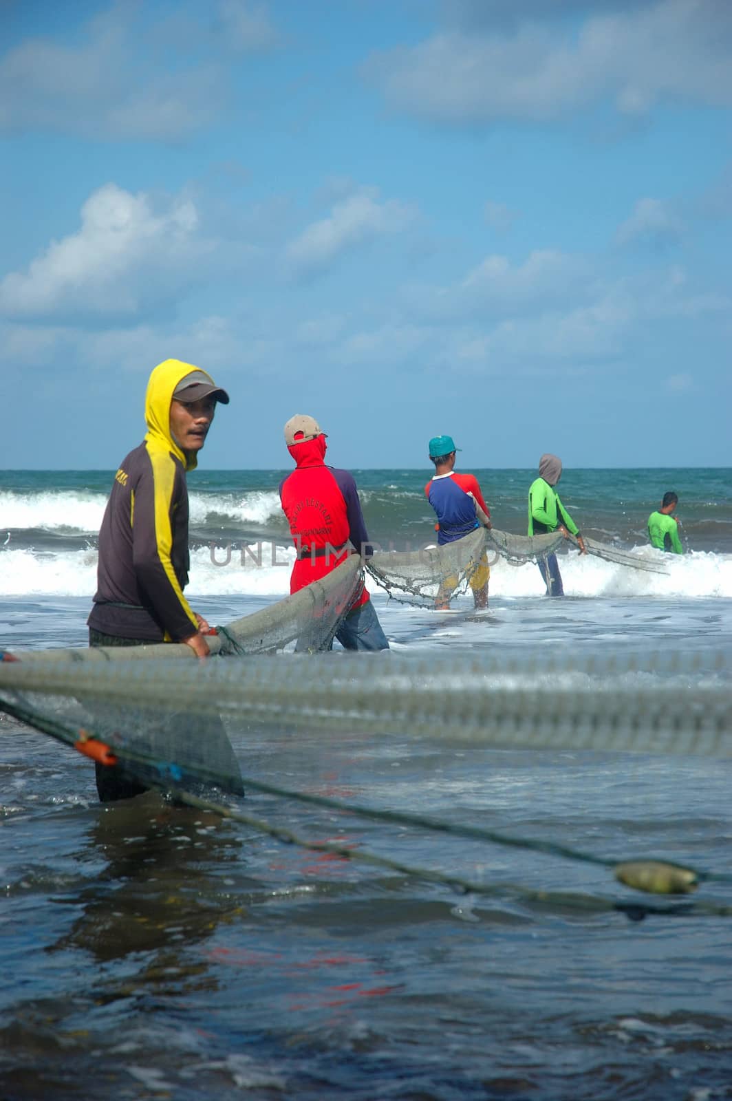 Pangandaran, Indonesia - July 16, 2011: Fisherman at Pangandaran beach, West Java-Indonesia.