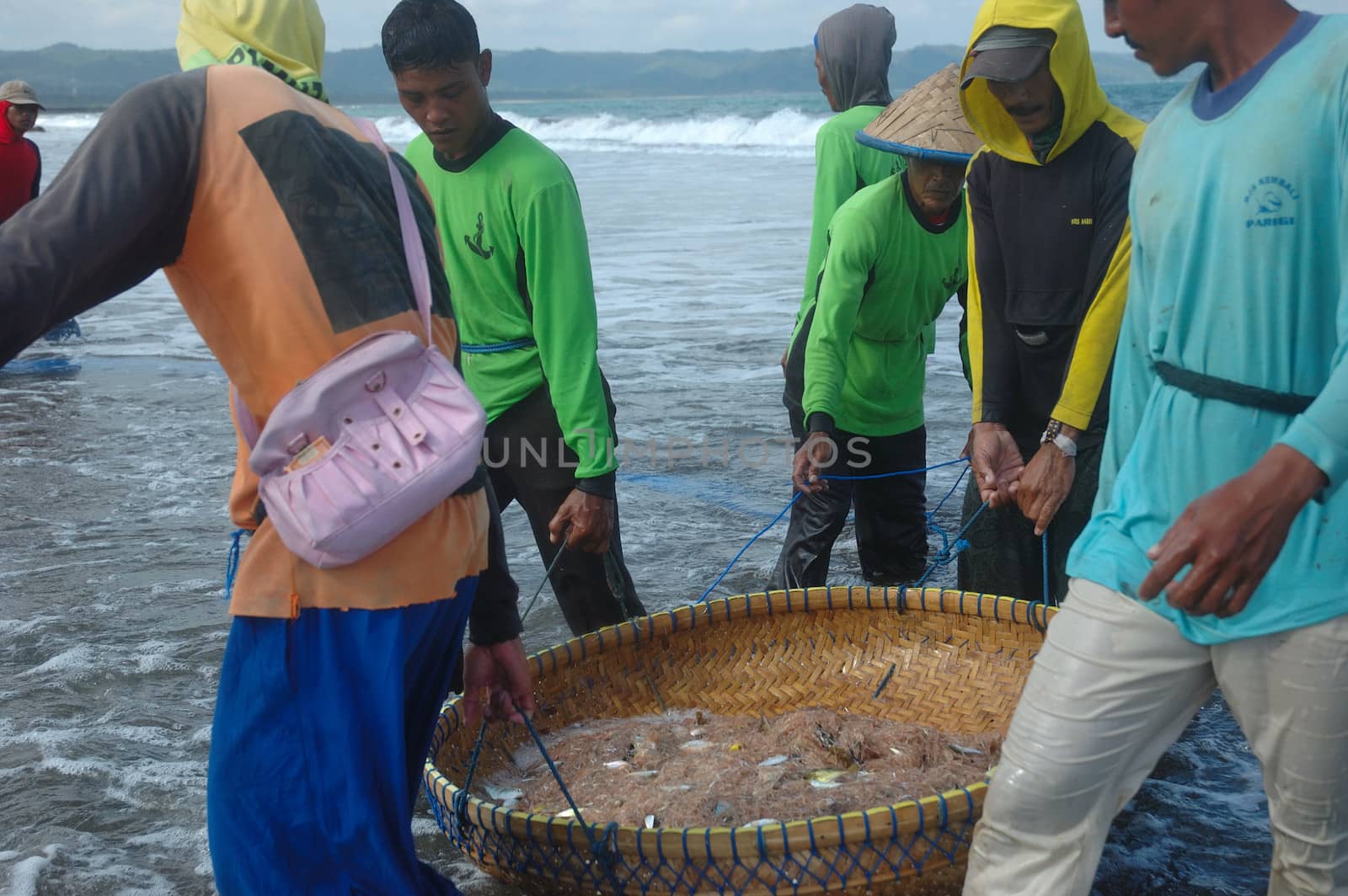 Pangandaran, Indonesia - July 16, 2011: Fisherman at Pangandaran beach, West Java-Indonesia.