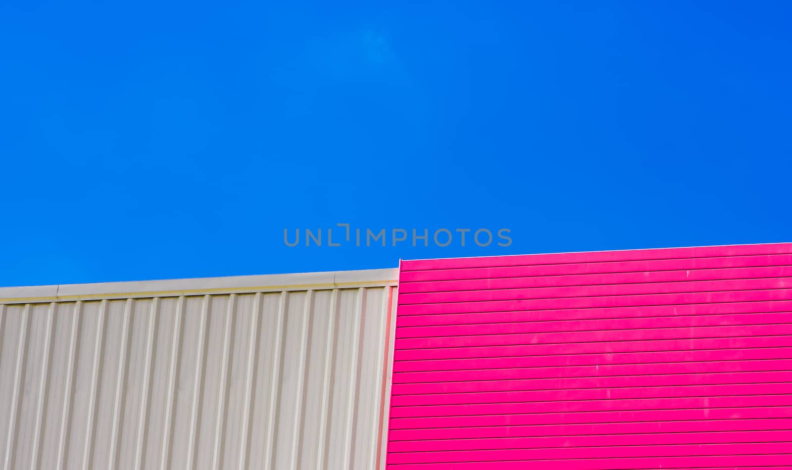 Colorful wall and blue sky.