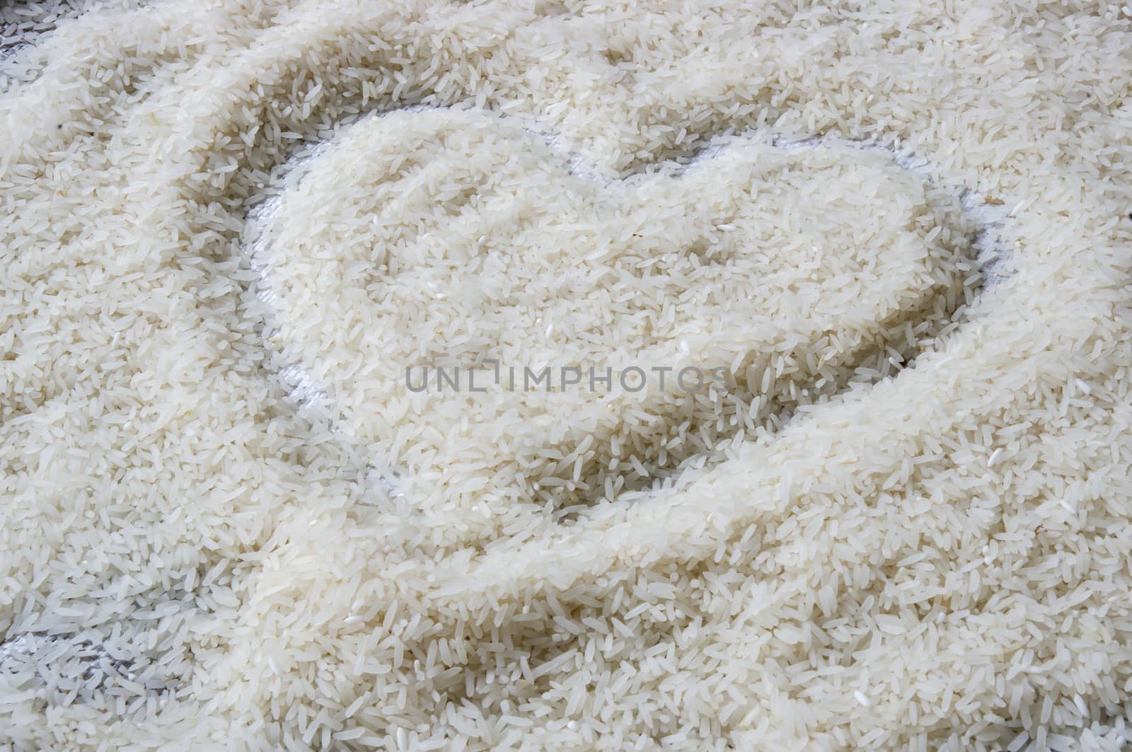 Uncooked jasmine rice heart sign
