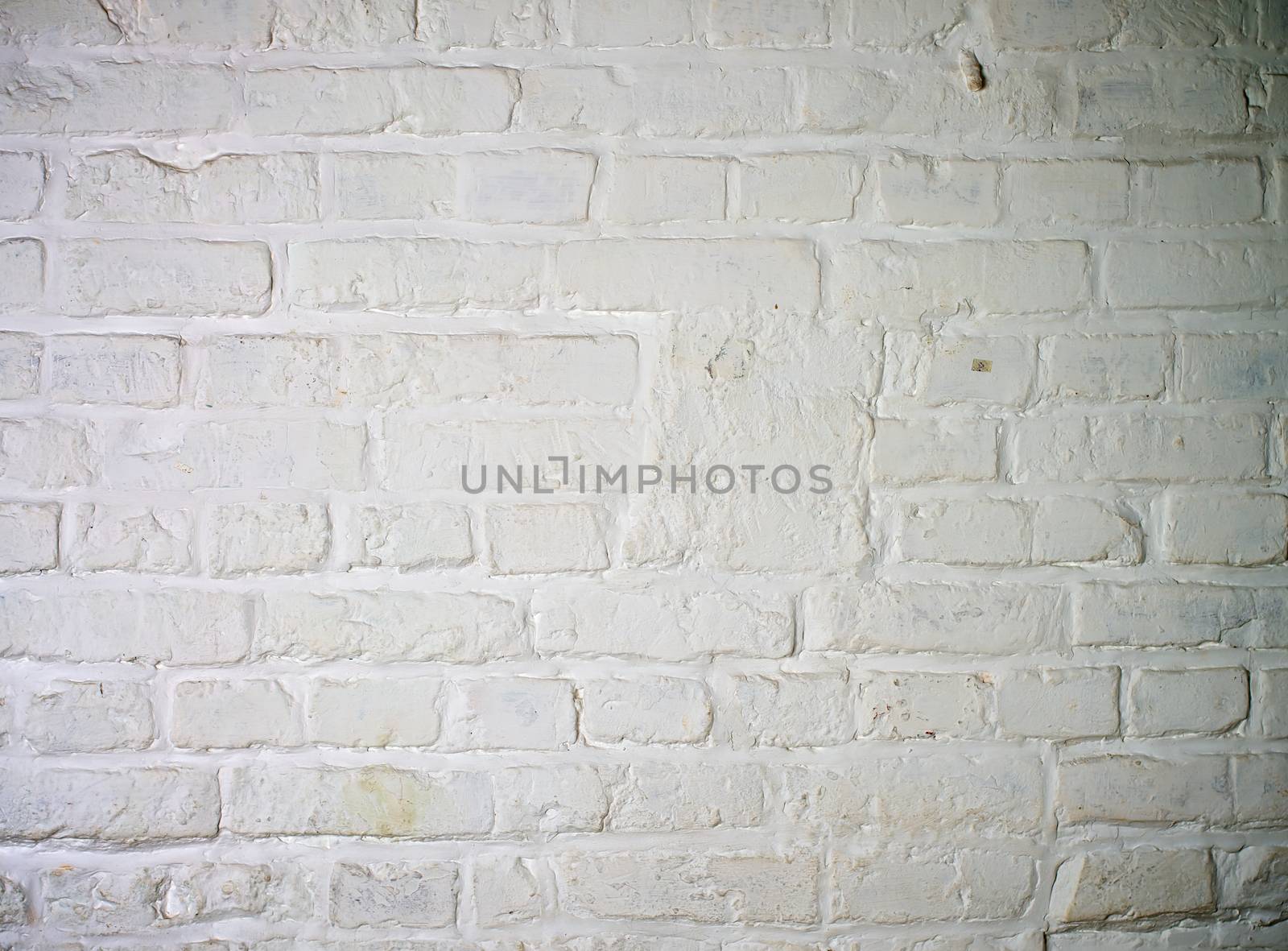 Background of Brick Wall Painted with White Mortar closeup