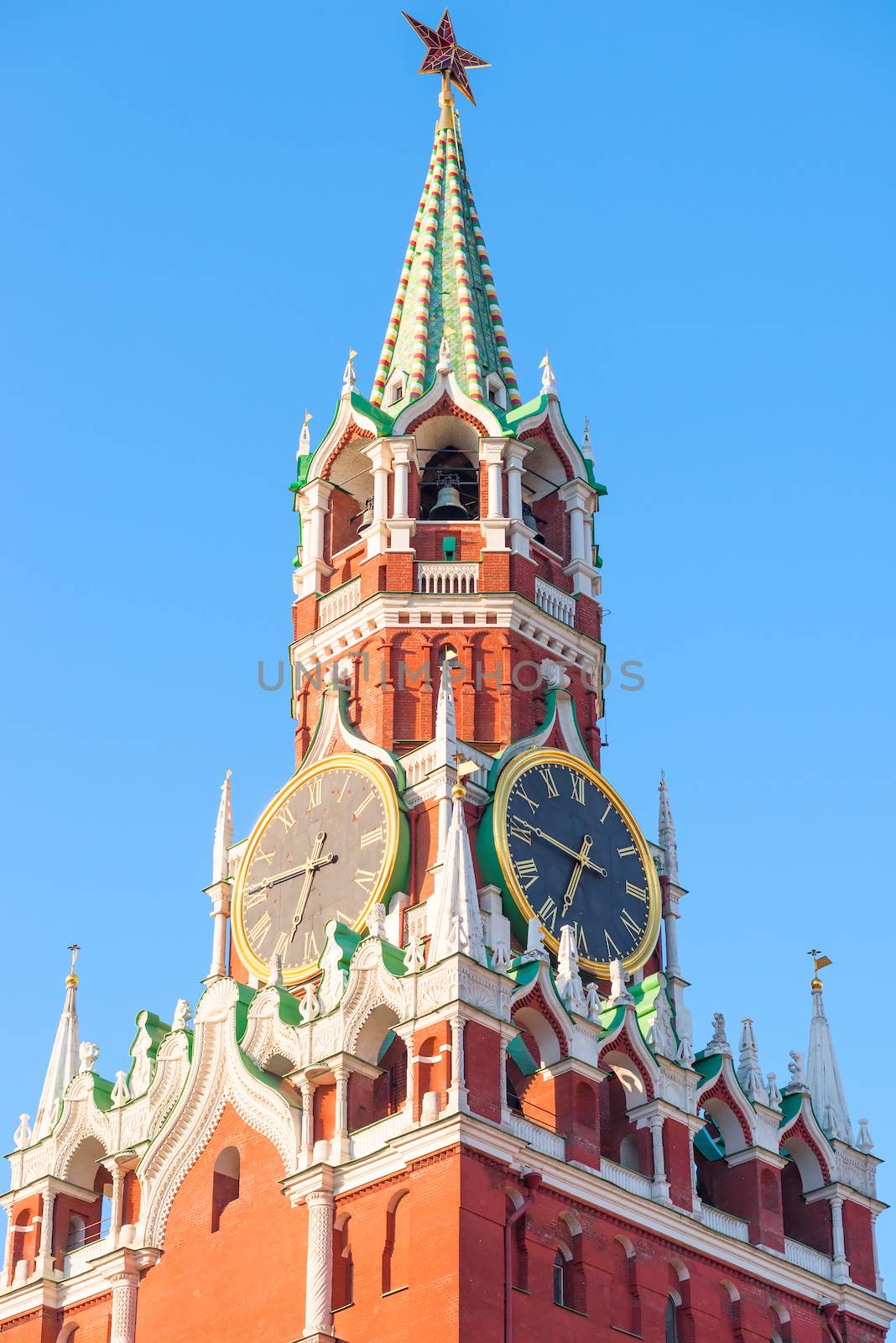 Kremlin tower with clock in Moscow at dawn