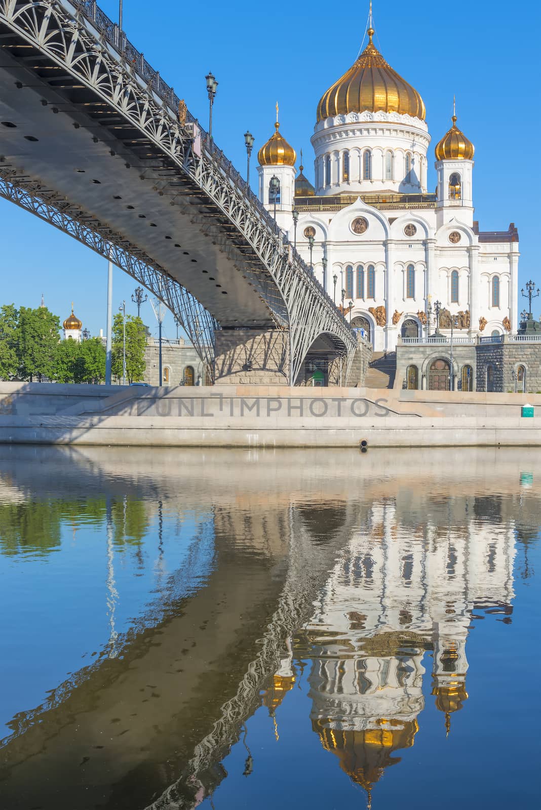 vertical shot of Christ the Savior and the bridge