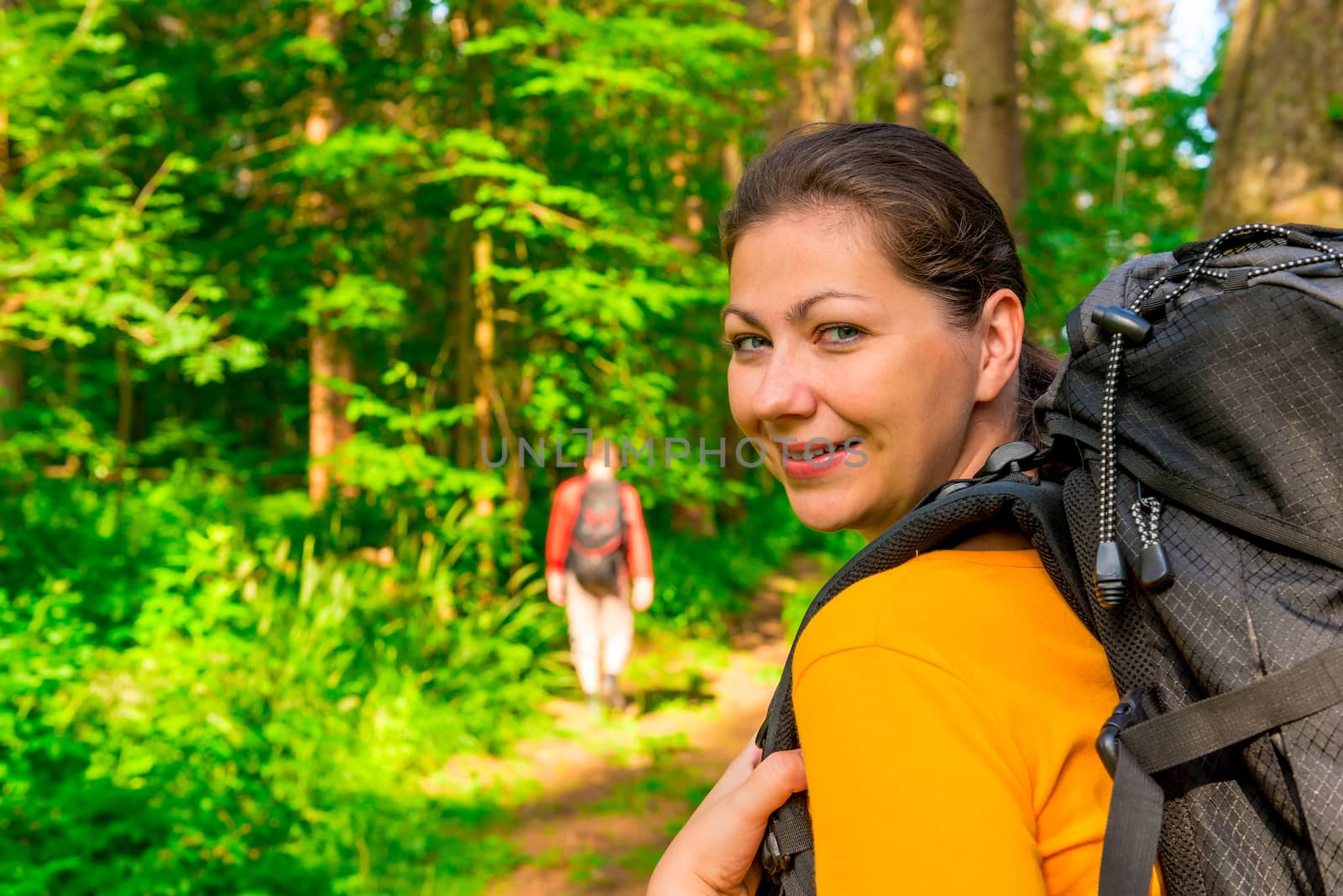 smiling girl and her man in a hike
