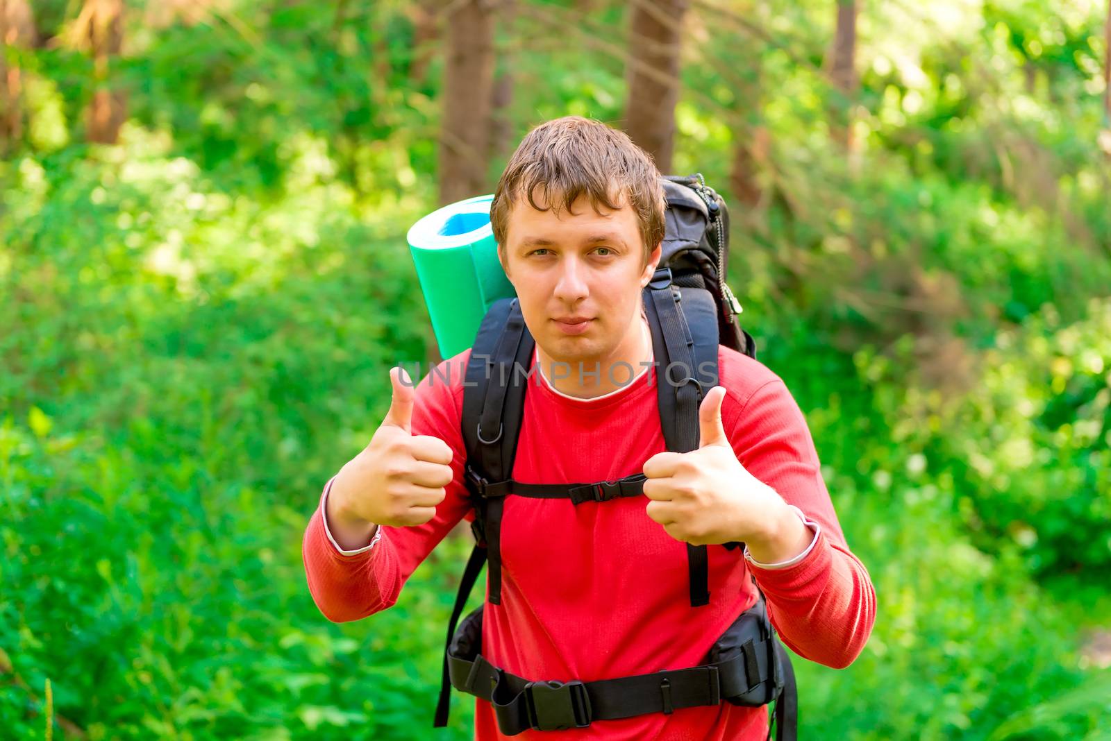 man in a hike enjoys the good weather by kosmsos111