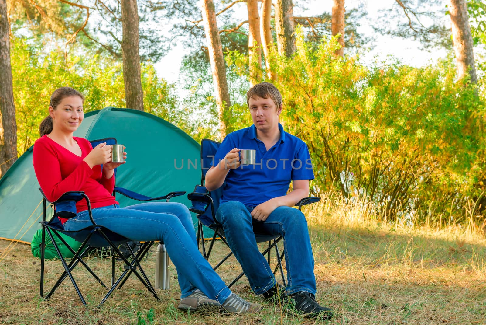 spouses drinking tea in the morning in a camp