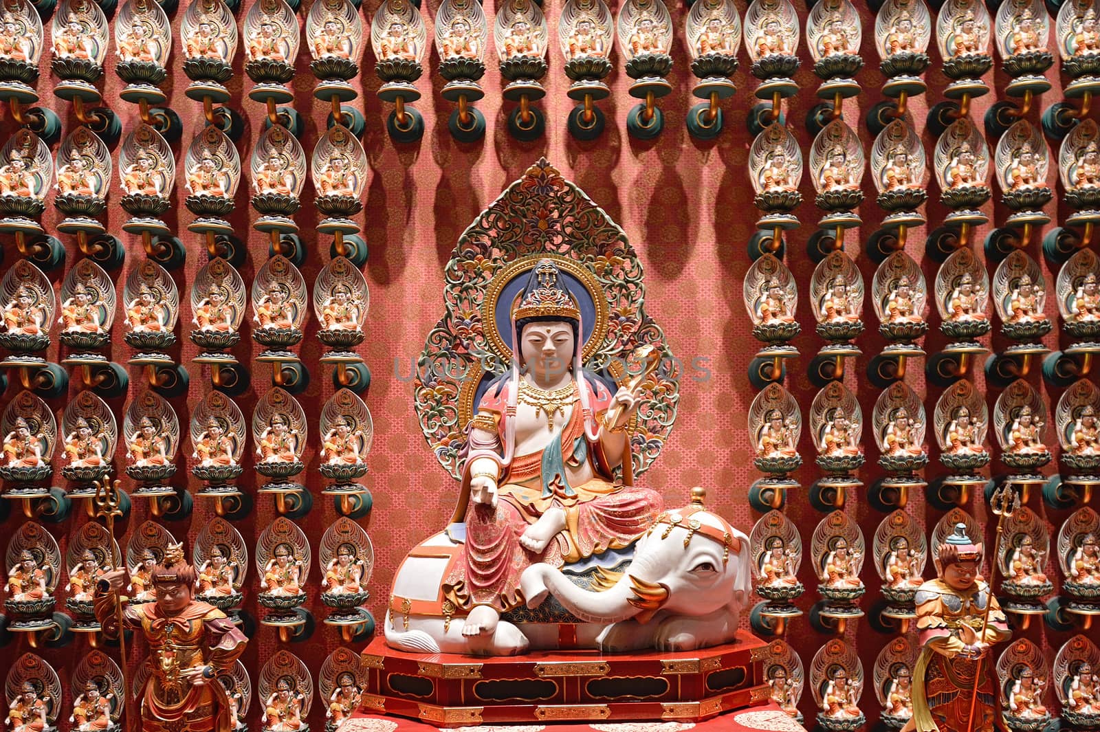 The statue of Buddha in Chinese Buddha Tooth Relic Temple in Sin by think4photop