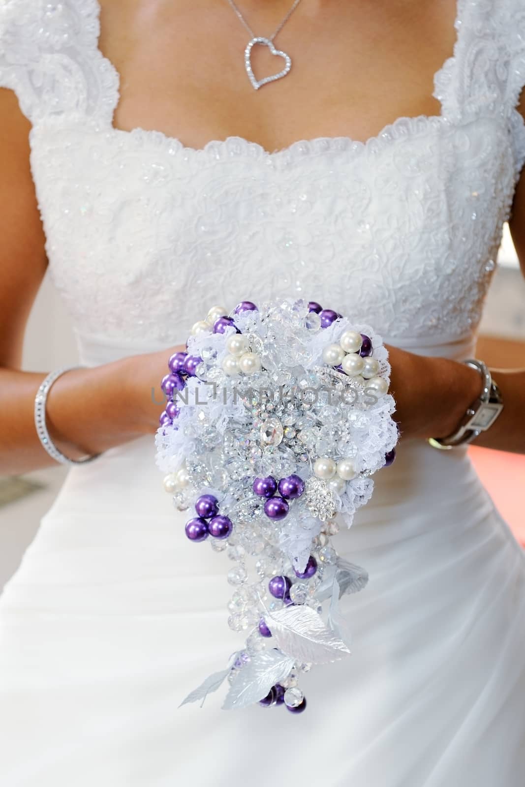 Bride bouquet closeup by kmwphotography