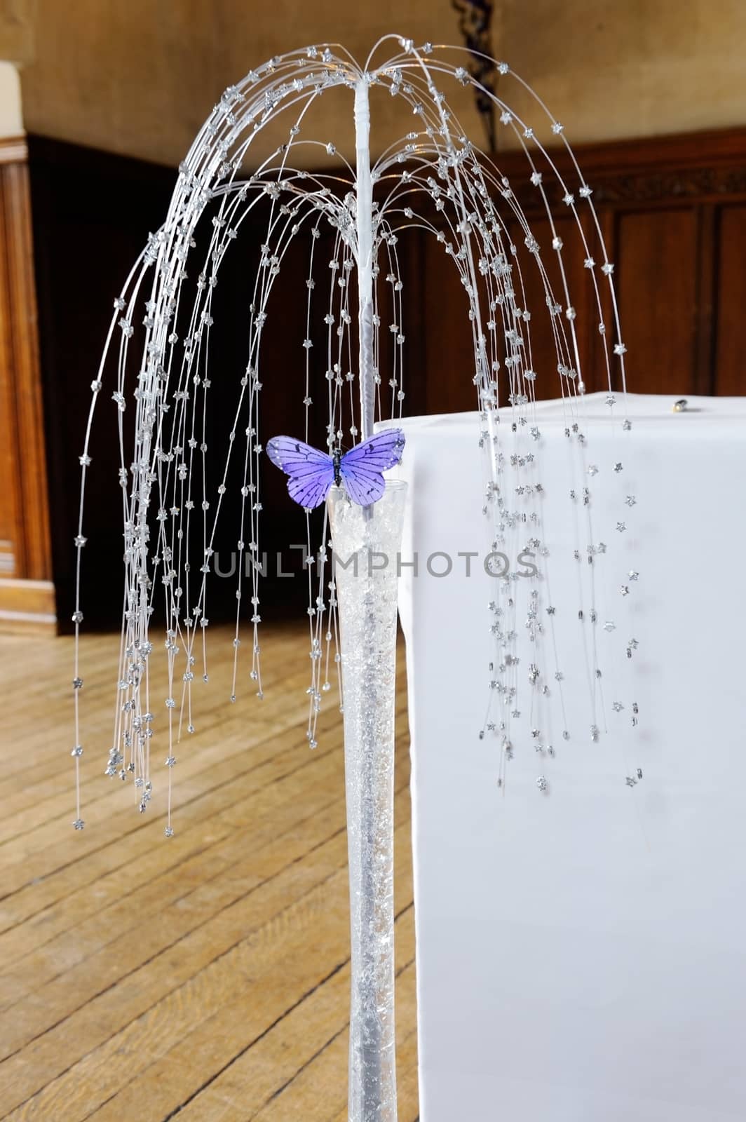 Purple butterfly decoration at wedding ceremony