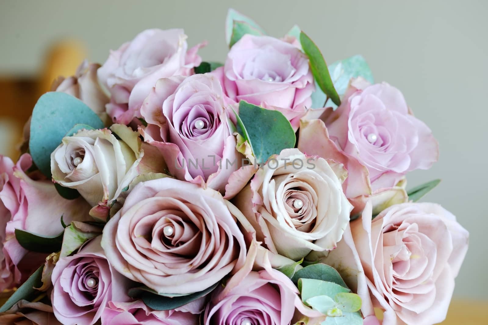 Brides bouquet of pink roses on wedding day