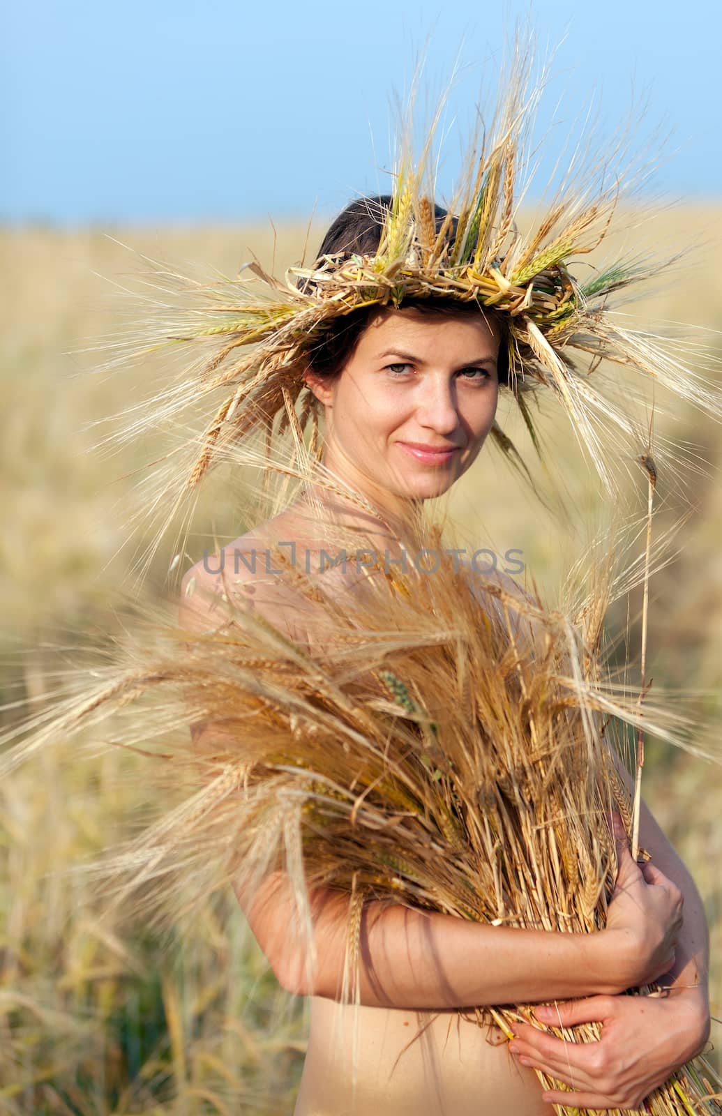 woman in field of wheat by vladimir_sklyarov