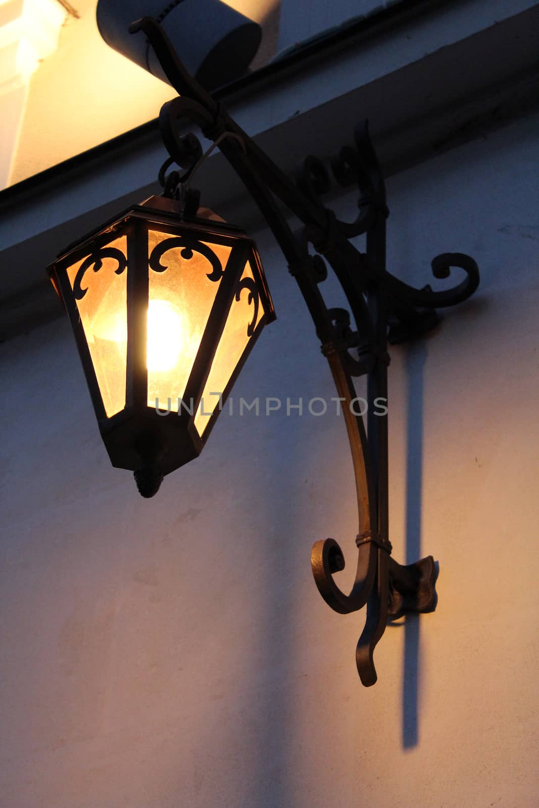 nice lantern on the wall of house