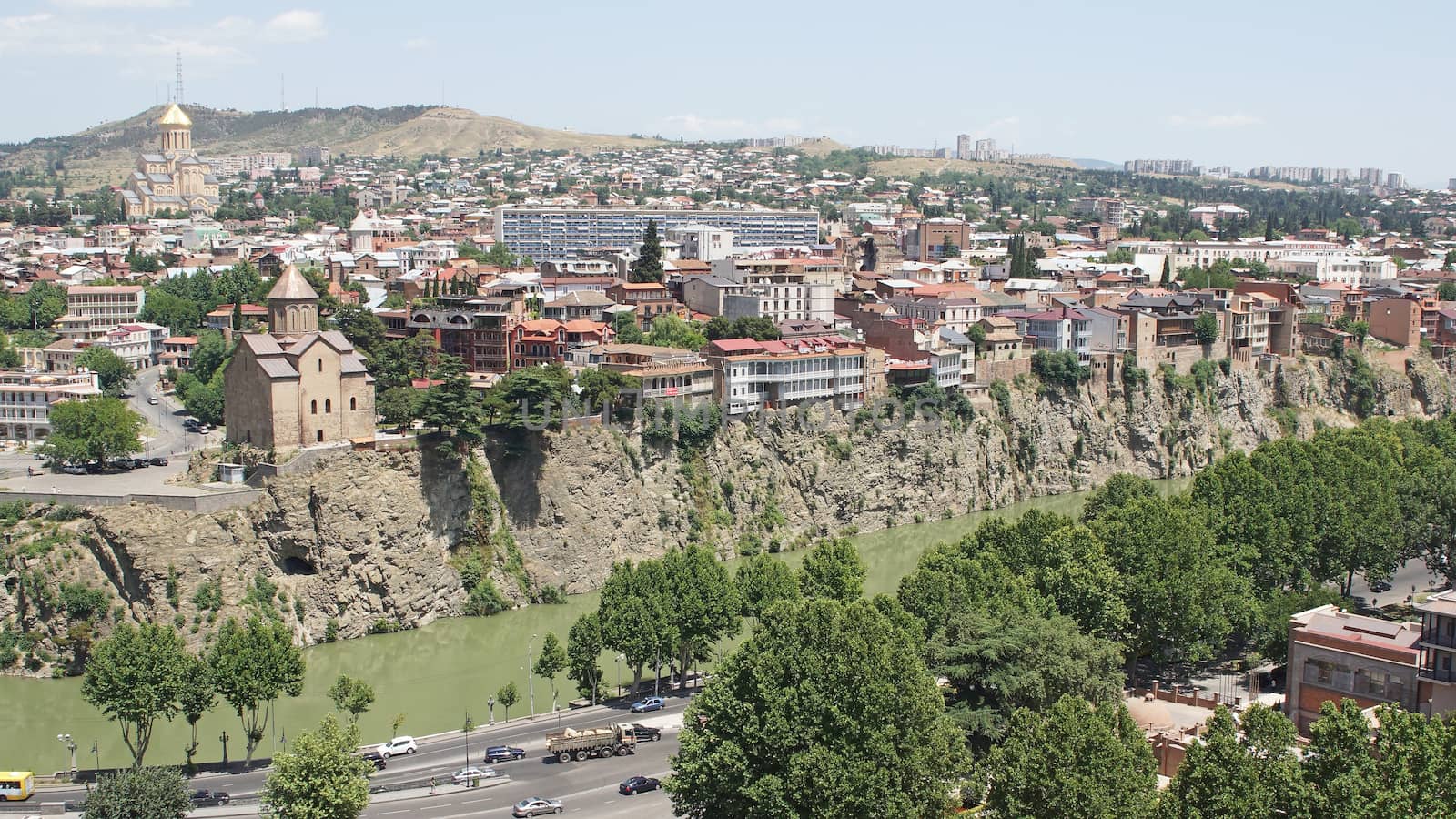 TBILISI, GEORGIA - JUNE 28, 2014: Panorama of Tbilisi with Trinity Church and Metechi Church on June 28, 2014 in Georgia, Europe