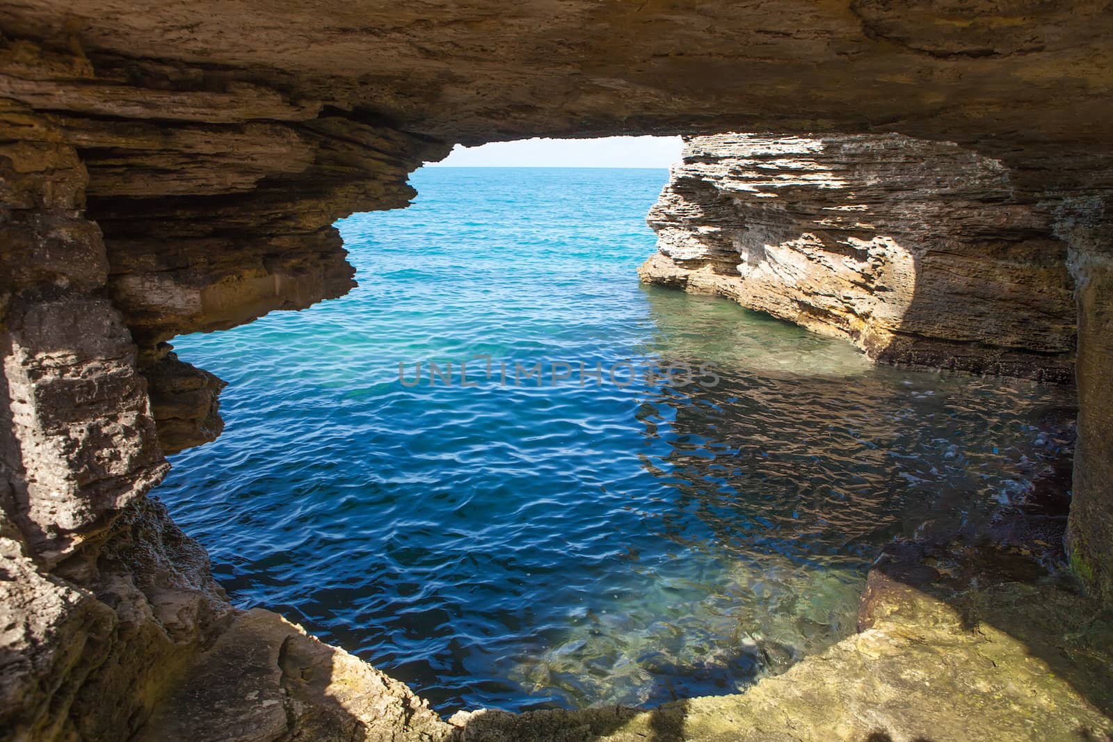 View of an ocean cave rock formation located on the island of Bermuda.  