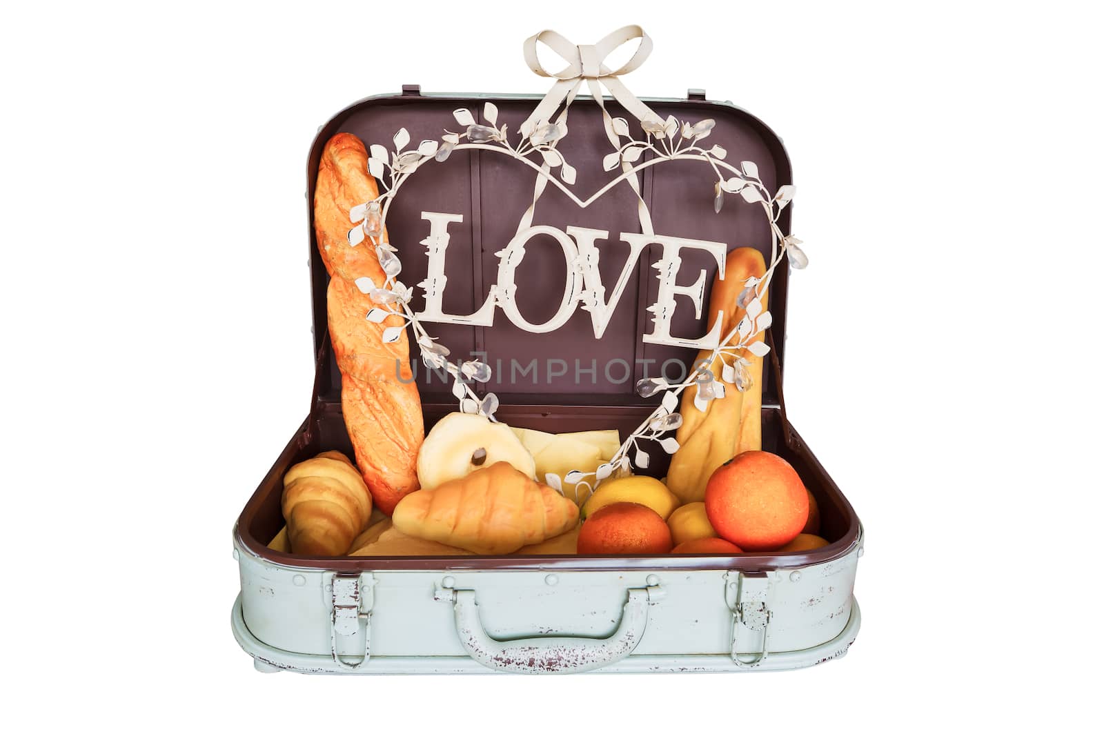 bread set in travel luggage with love on white background
