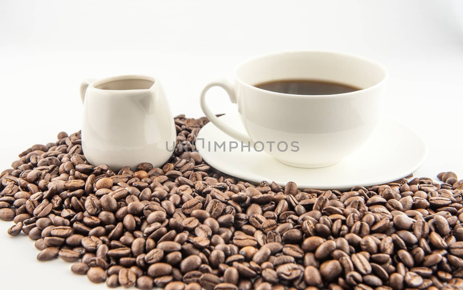 Coffee cup and beans.