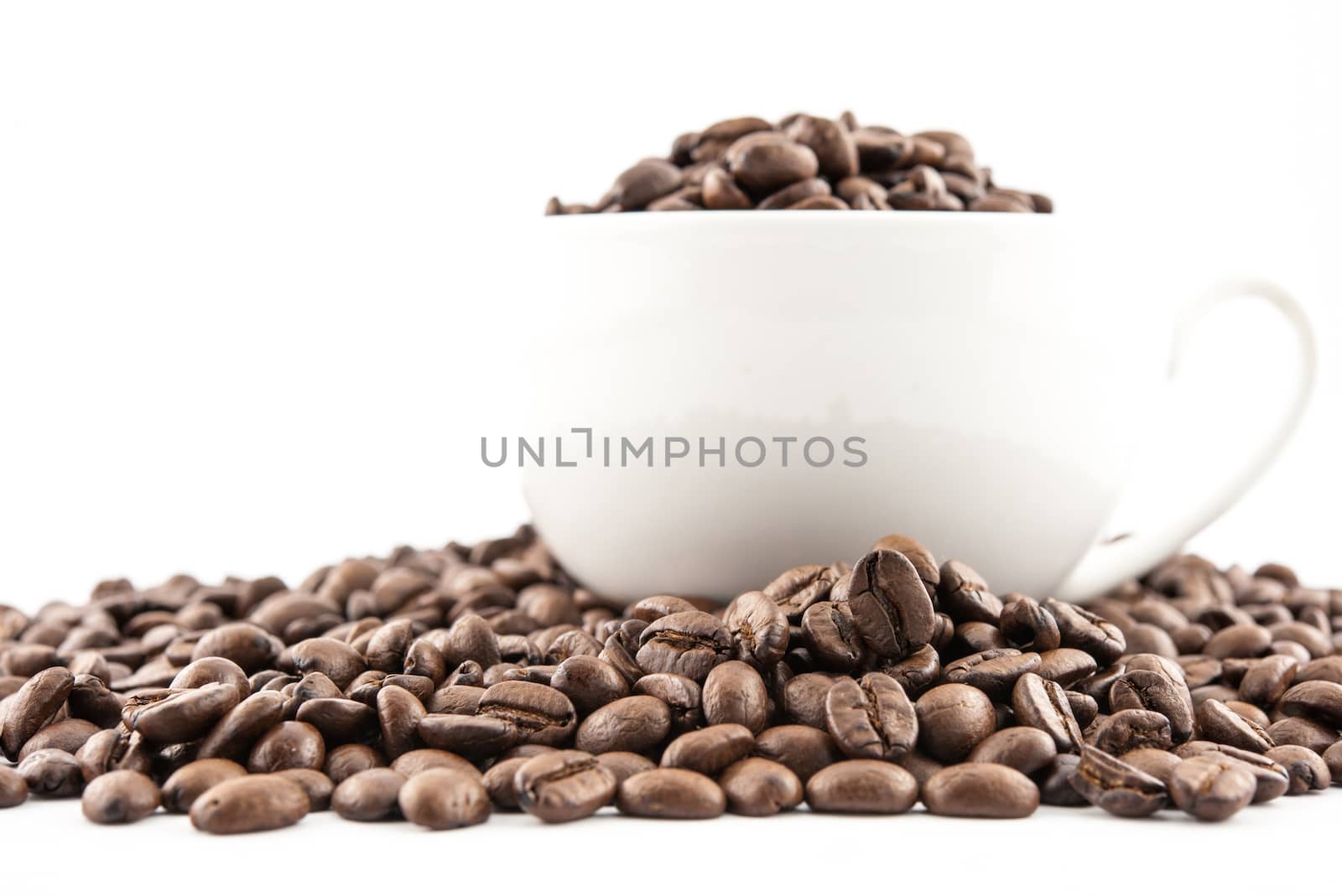 Cup and coffee beans