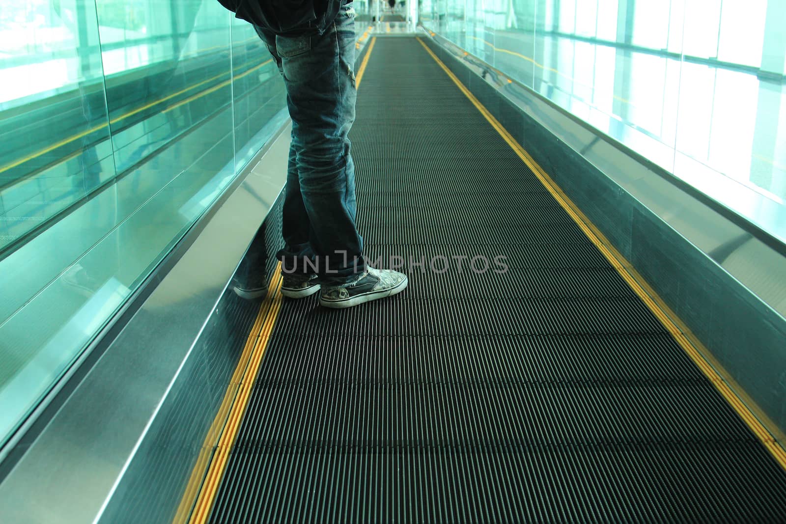 Movement of escalator with people by foto76