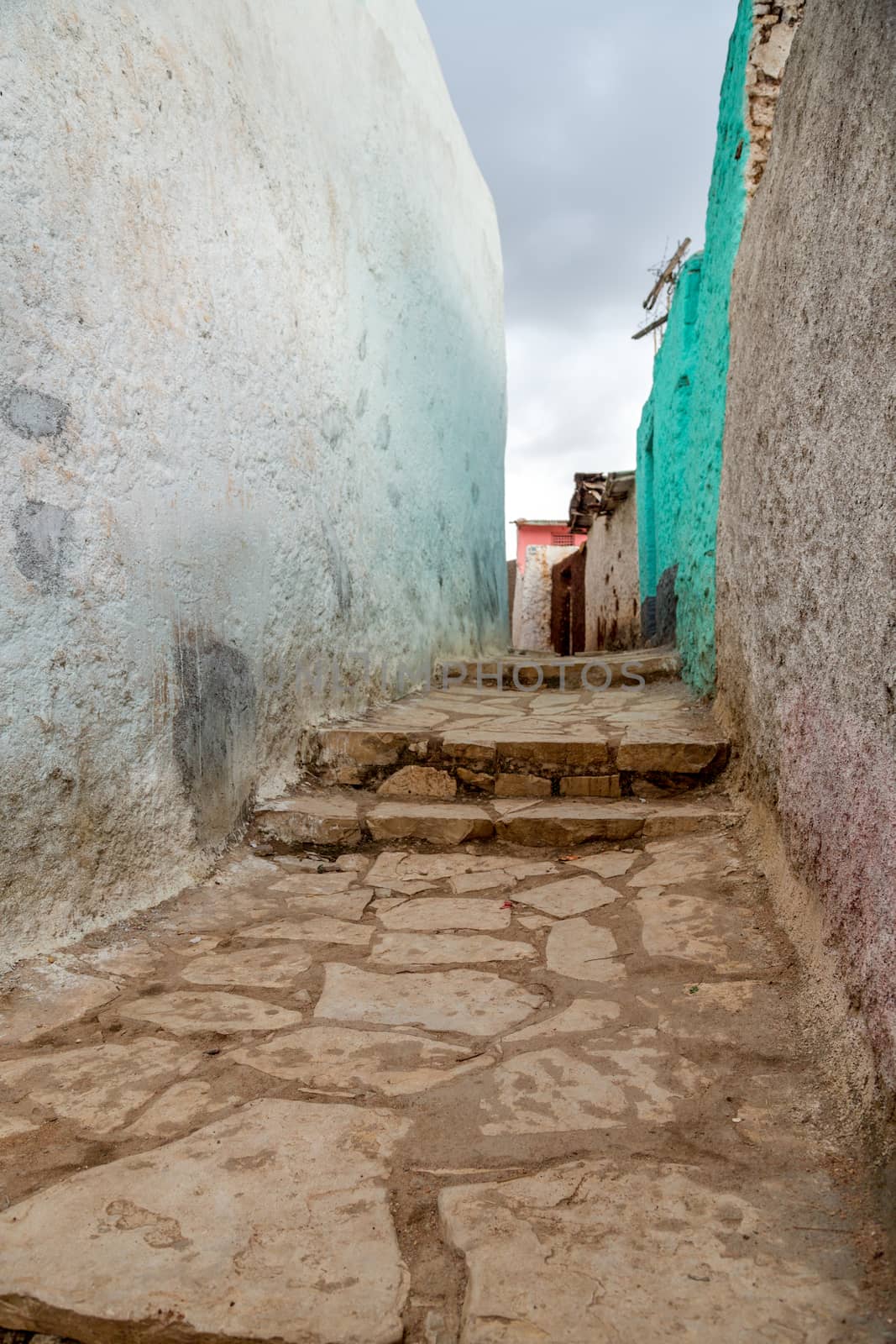 HARAR, ETHIOPIA - JULY 26,2014 - Local residents of Jugol, the fortified historic walled city within Harar, which was included in the World Heritage List for its cultural heritage by UNESCO and considered as the fourth holy city of Islam.