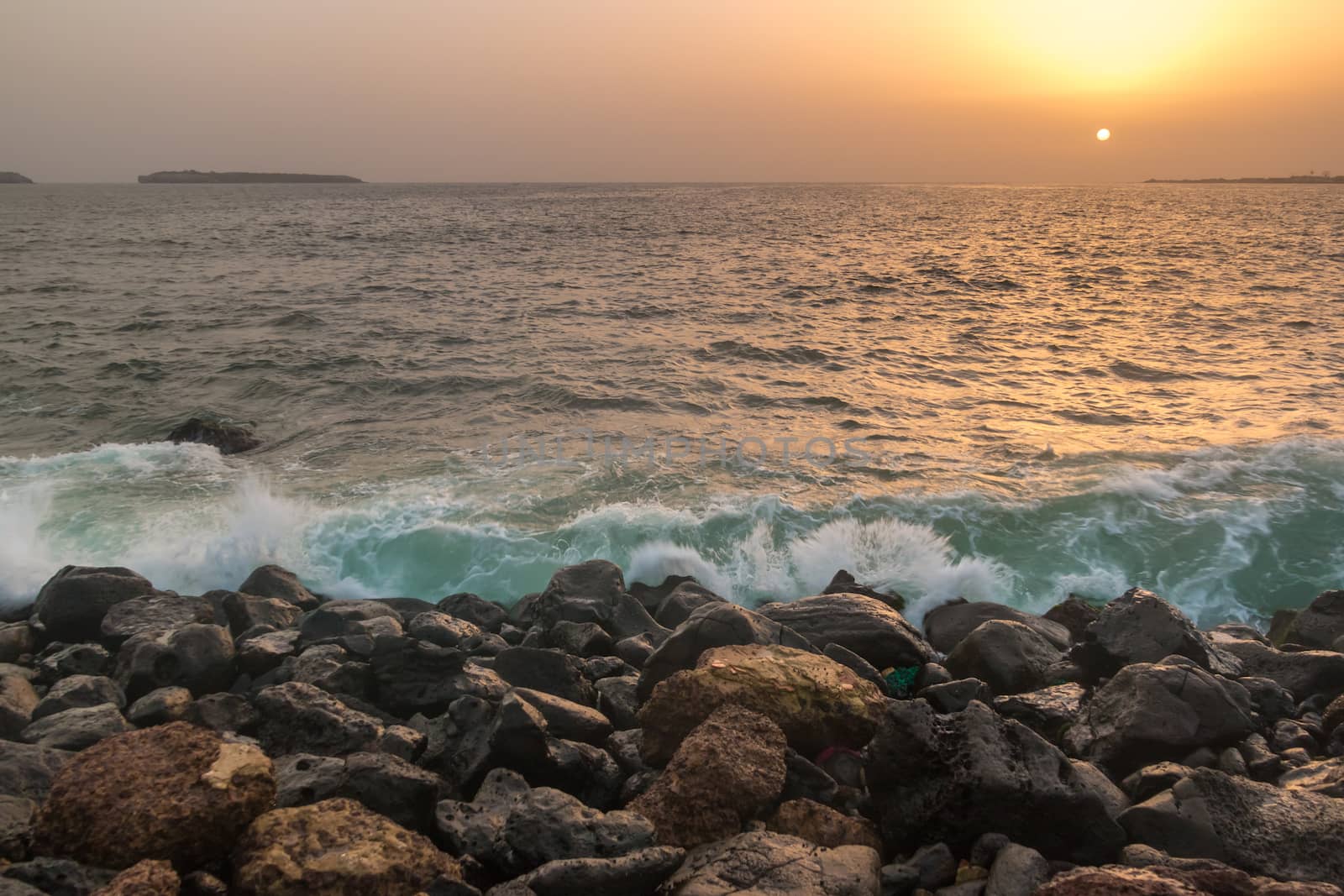 The beautiful waters of the Atlantic ocean with its rocky coastline near the City of Dakar in Senegal