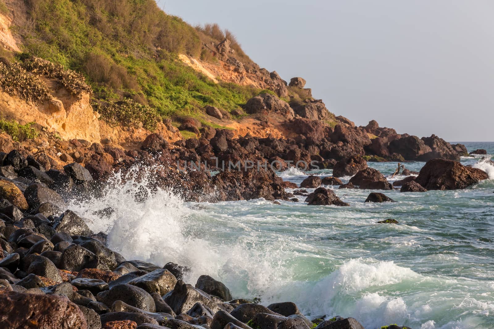 The beautiful waters of the Atlantic ocean with its rocky coastline near the City of Dakar in Senegal