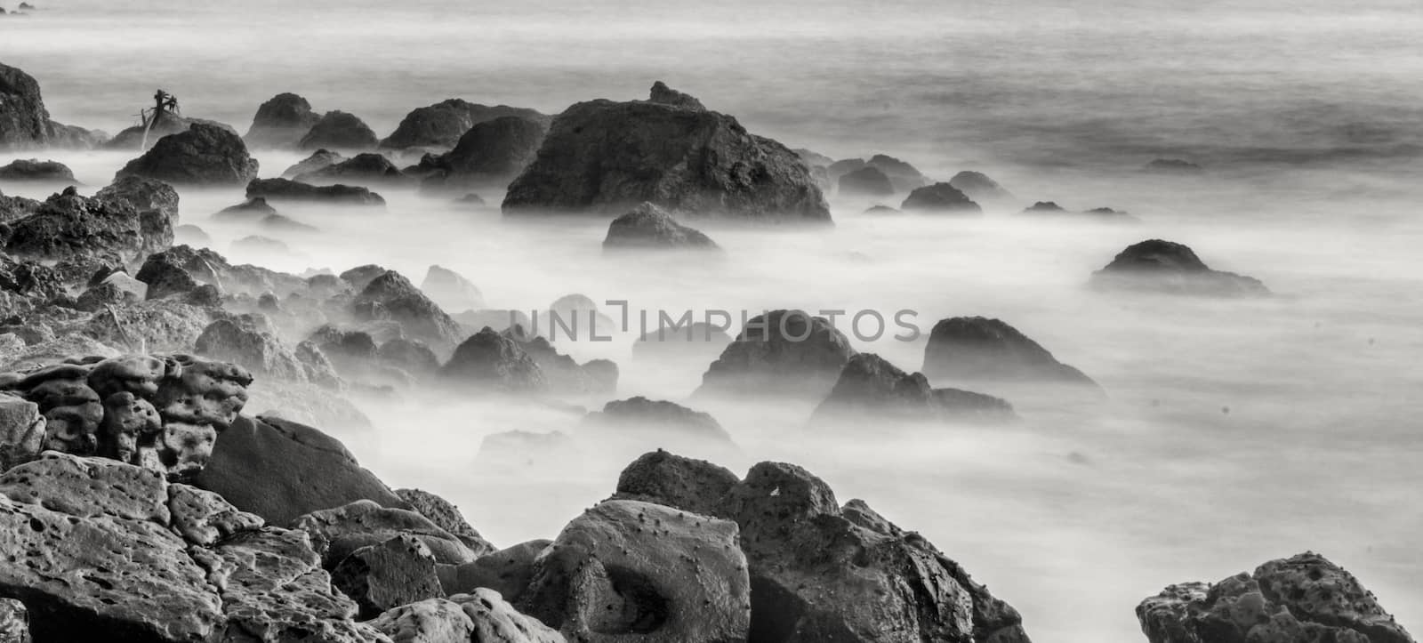 The beautiful waters of the Atlantic ocean with its rocky coastline near the City of Dakar in Senegal