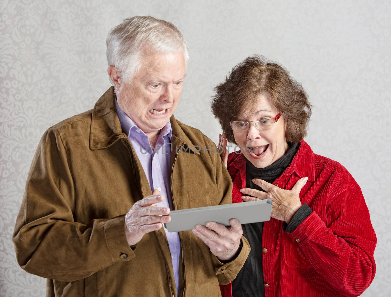 Shocked Couple with Tablet by Creatista