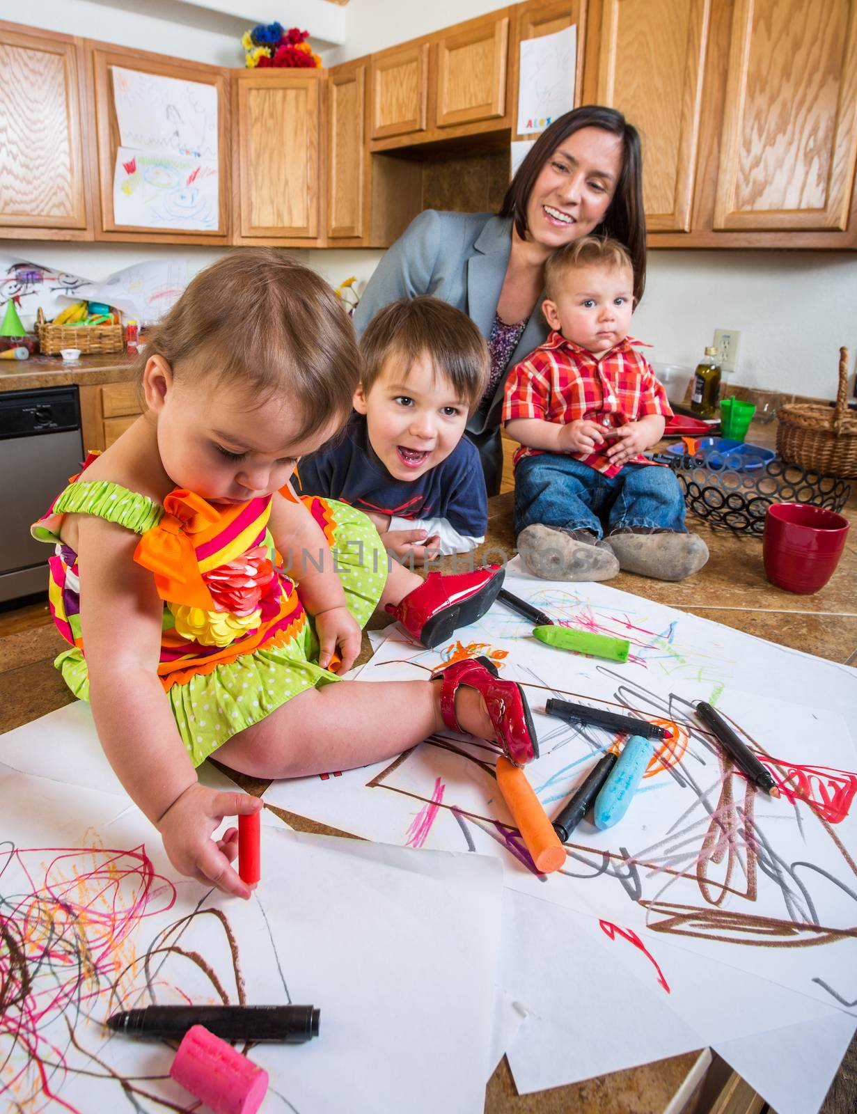 Family spending time together in kitchen