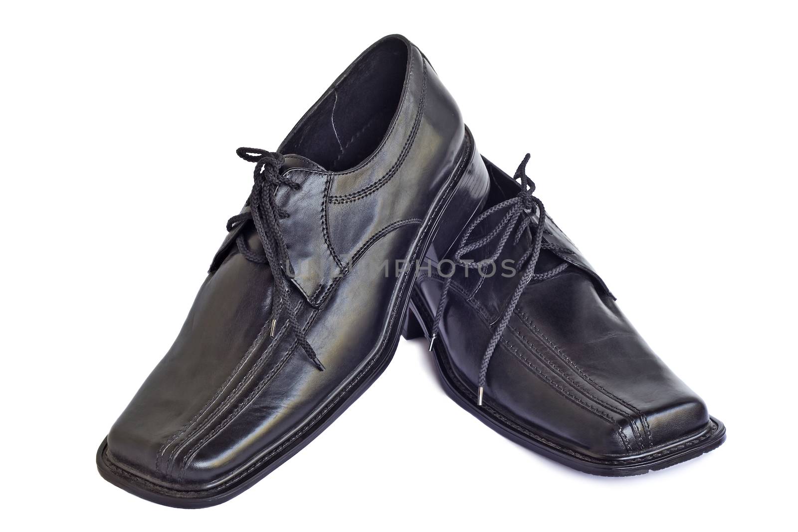 Convenient man's shoes from a genuine leather of black color. Are presented on a white background.