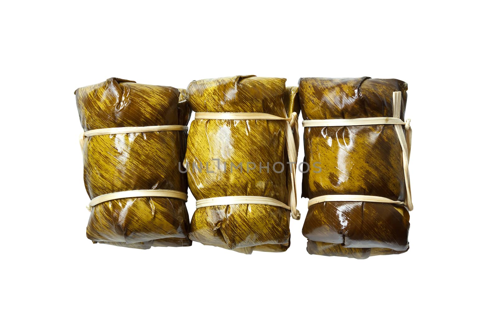 Thai dessert sticky rice with banana isolated on white