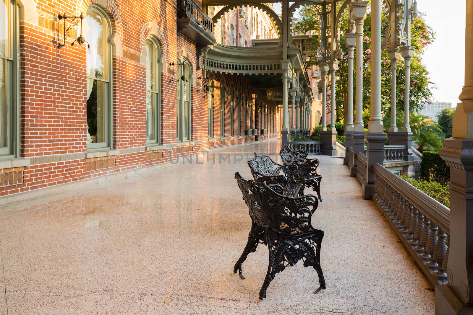 Cast iron chairs on the marble patio or balcony of Henry B Plant museum is moorish inspired architecture part of the University of Tampa.