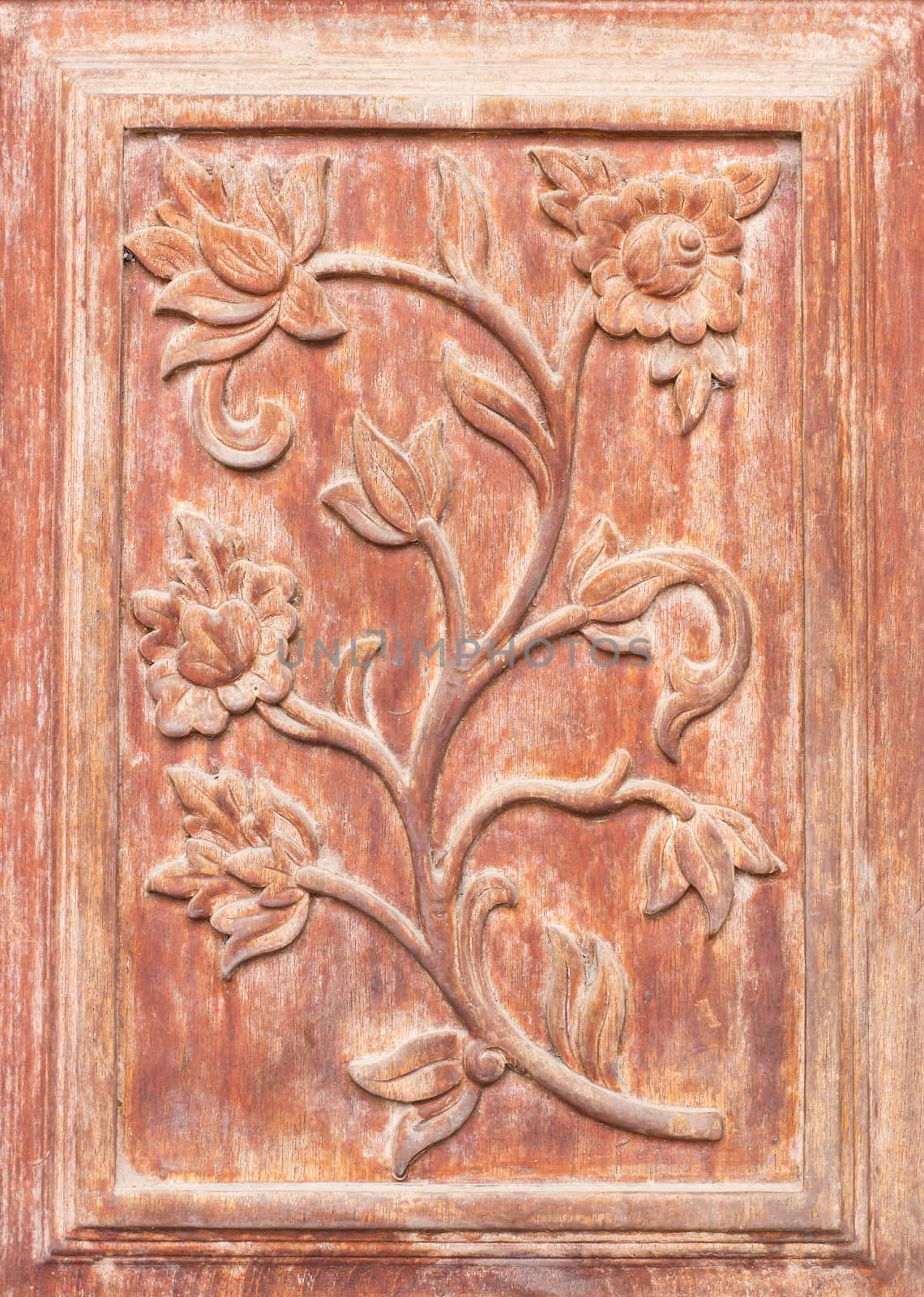 Pattern of flower carved on wood