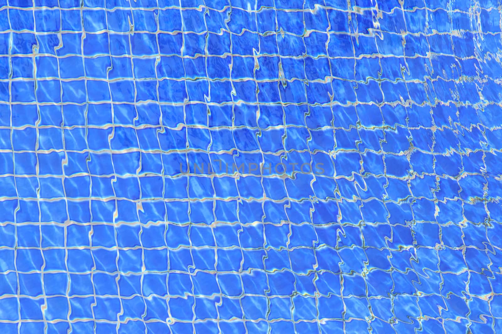 blue ripple water in swimming pool   by vitawin