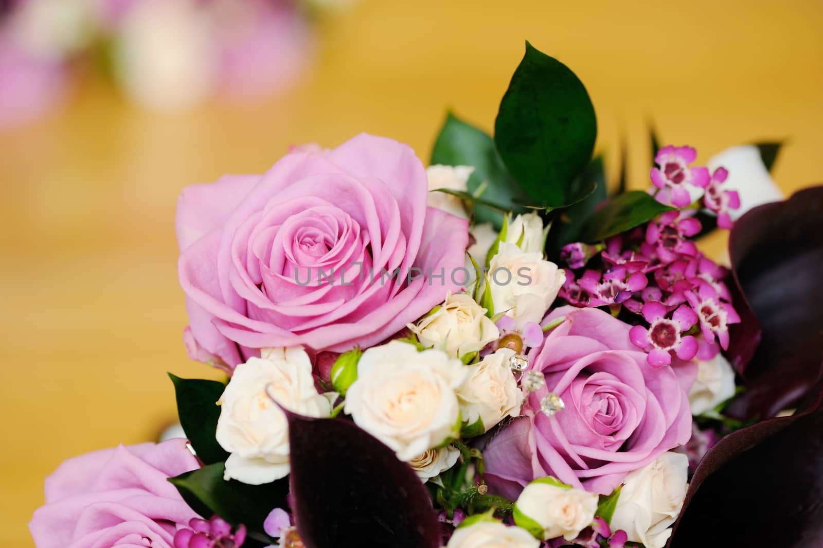 Detail of brides bouquet of pink roses on wedding day
