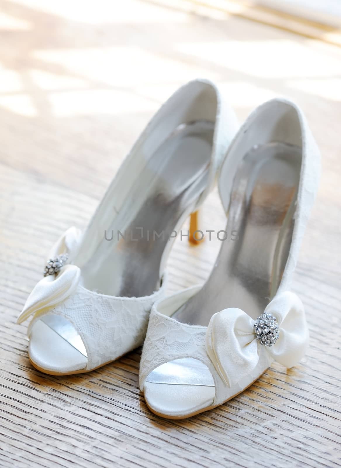 Brides white shoes on wedding day