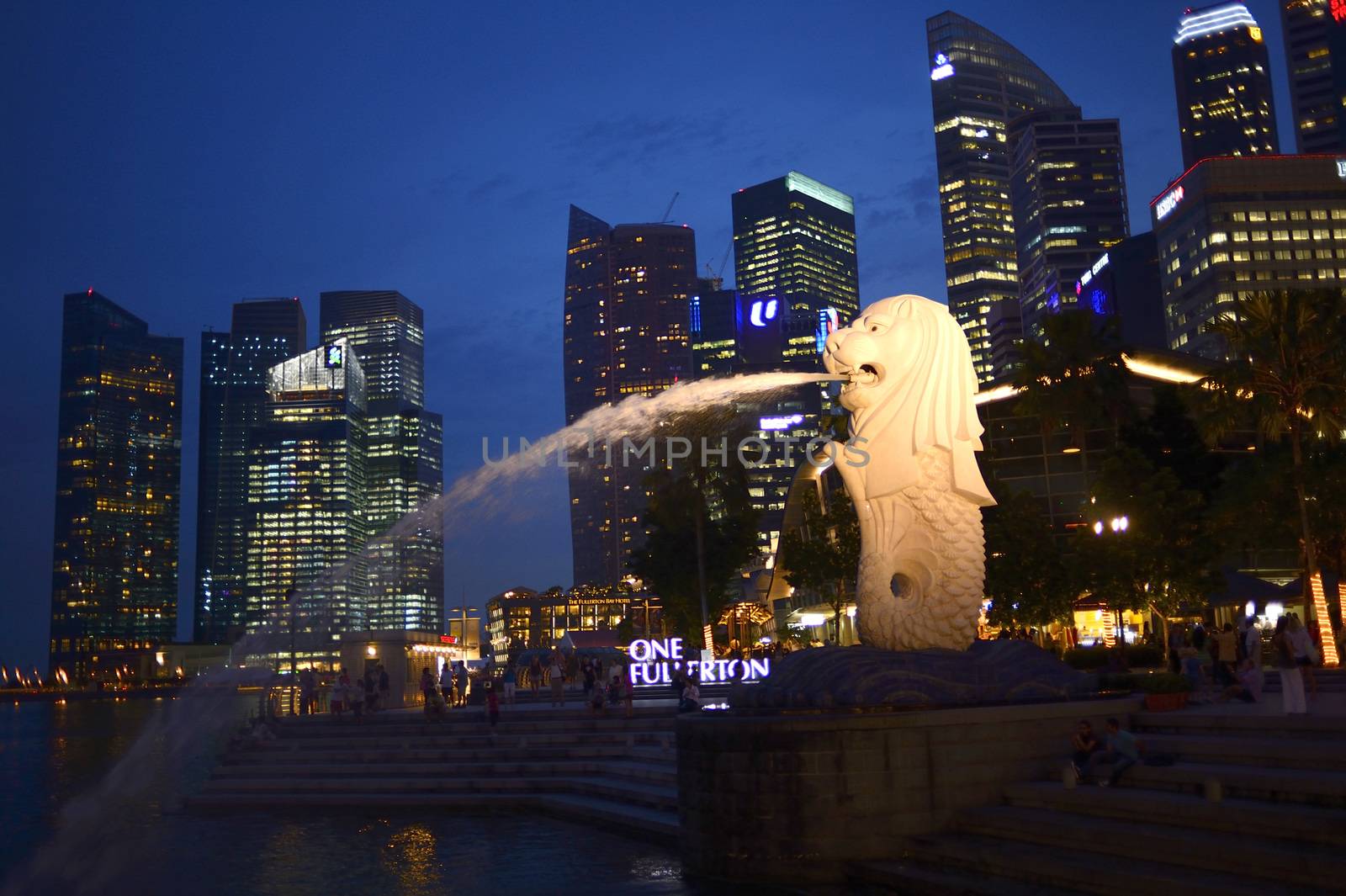 SINGAPORE-Apr 30:Th e Merlion fountain Apr 30, 2012 in Singapore.Merlion is a mythical creature with the head of a lion and the body of a fish,and is a symbol of Singapore.