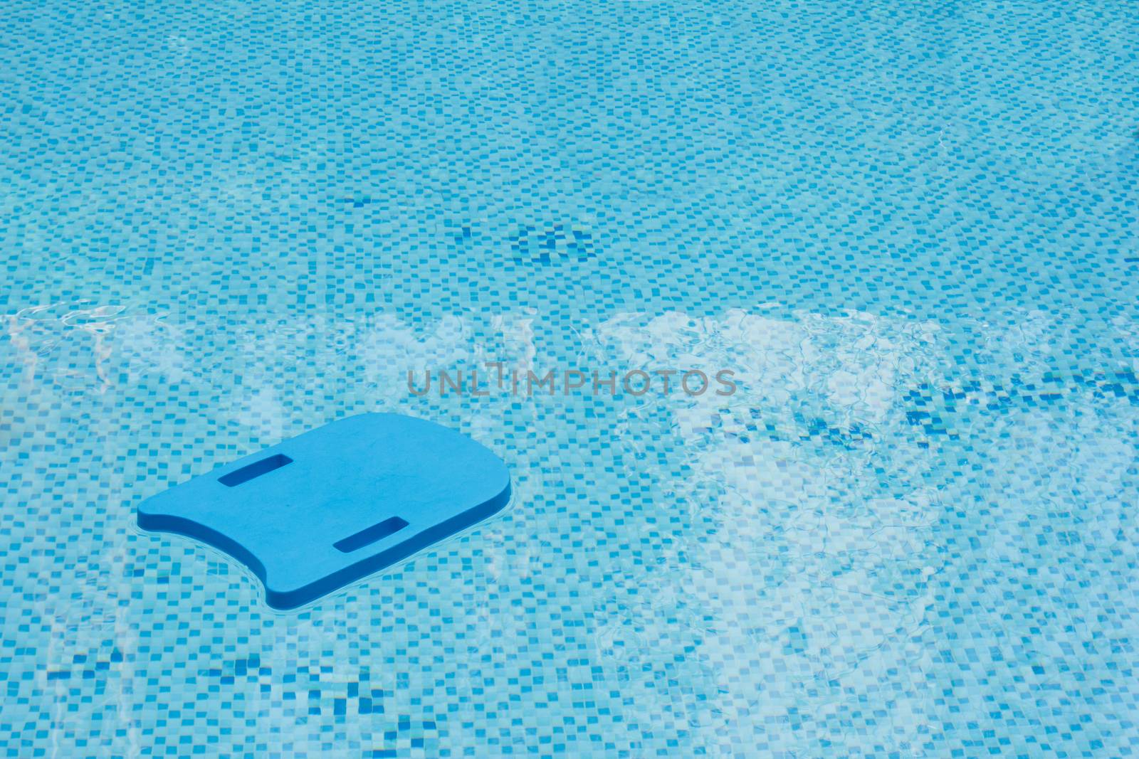 Kick board in swimming pool by vitawin