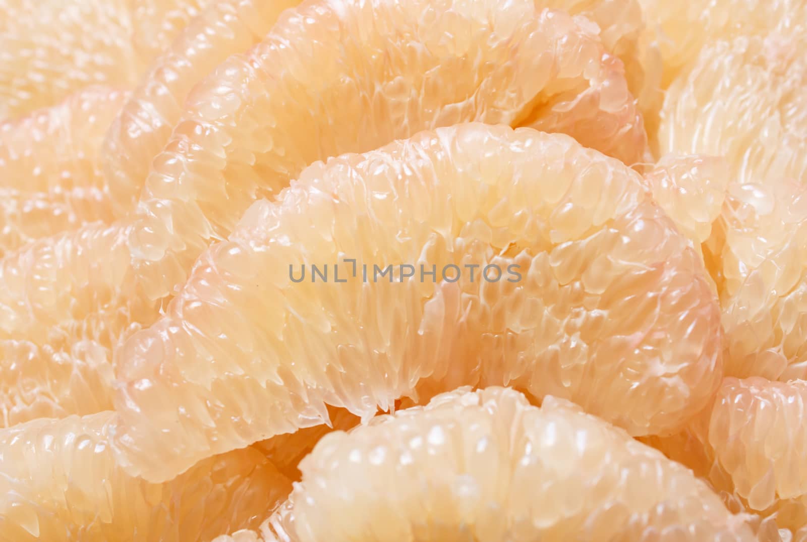 peeled pomelo pieces fruit by vitawin