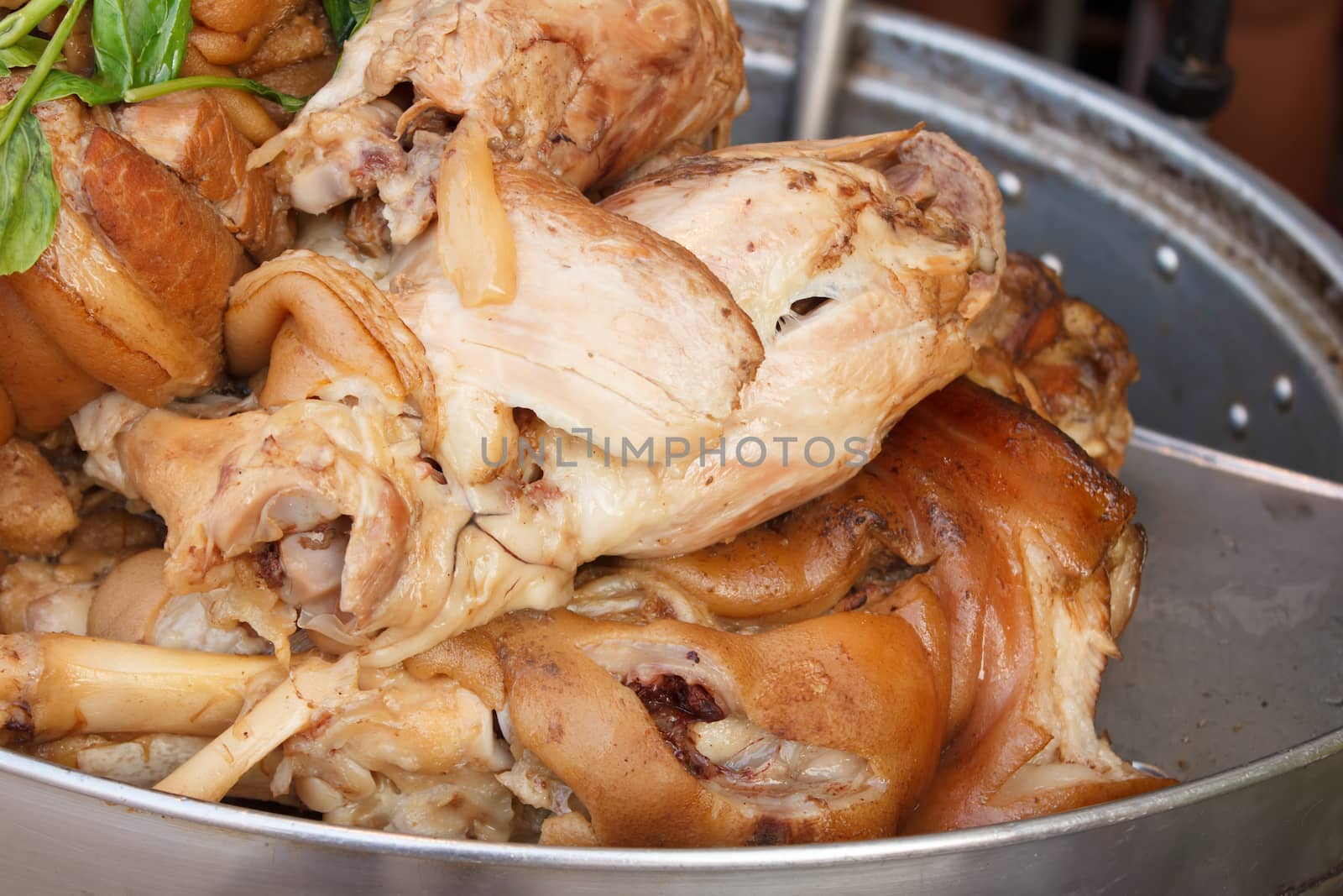 Stewed pork leg in steaming pot