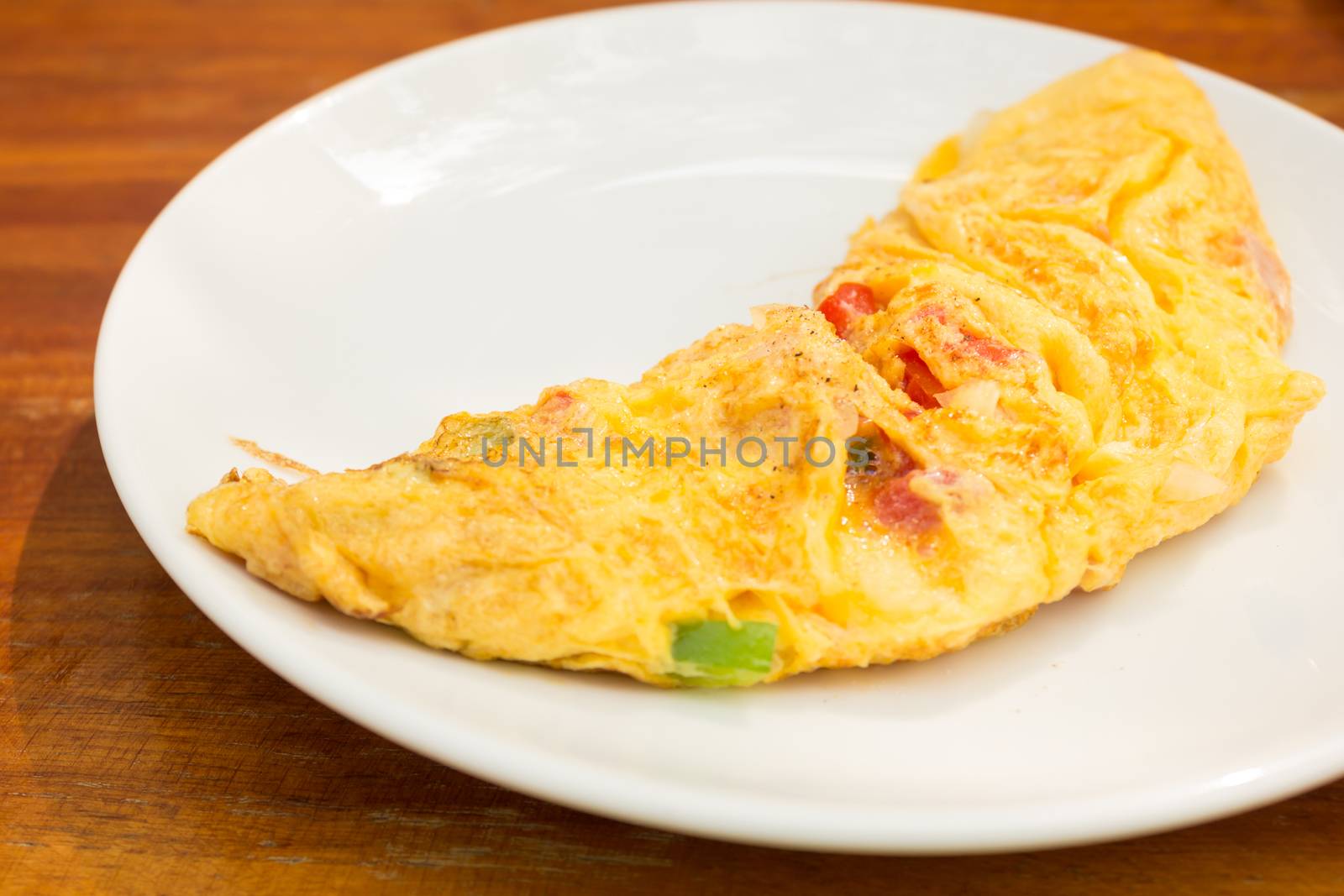 Close up omelette and vegetables